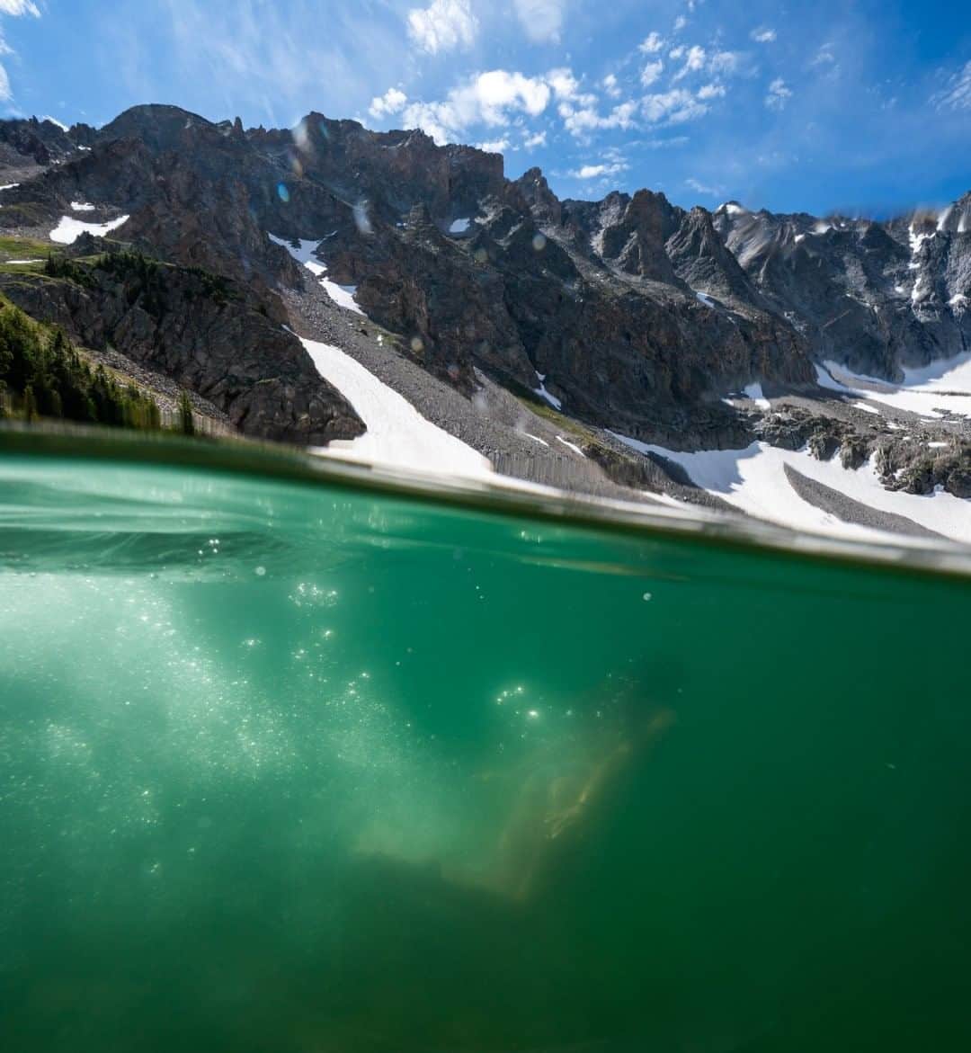 National Geographic Travelさんのインスタグラム写真 - (National Geographic TravelInstagram)「Photo by Pete McBride @pedromcbride  I recently hiked into the quiet of the hills with two of my nieces to a favorite high mountain lake in Colorado's Rocky Mountains. With just a tad of encouragement, we all took the polar bear plunge. It was special to share their first high-altitude, icy water dip. Happy summer swims, everyone.  For more mountain views around the world, follow @pedromcbride. #alpinelake #cold #nature #sonyalpha #swimming」7月18日 11時03分 - natgeotravel