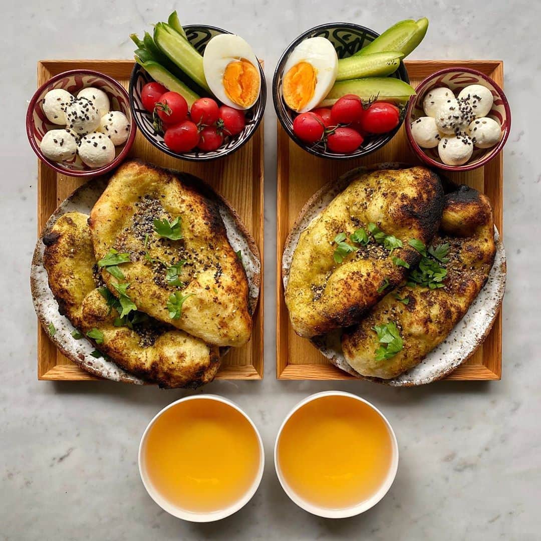 Symmetry Breakfastさんのインスタグラム写真 - (Symmetry BreakfastInstagram)「#ad🔥 COMPETITION CLOSED! Congratulations to @dylanger11 enjoy your fabulous @oonihq ! 🔥  We’re gave away an Ooni Pro, Pro Gas Burner, 14” Wooden and Perforated Peel, Ooni Pizza Cutter and Ooni Pro Cover!  To enter, it’s simple: Follow me, @symmetrybreakfast, and my friends at @oonihq  Comment on either of our posts tagging a friend you would make pizza for! Tag as many friends in separate comments as you like - each comment counts as an entry!  Ts and Cs apply: link in bio. - - - - - - - - - - - - Delicious maneesh style breads, using a 72 hour pizza sourdough, fluffy charcoal cooked with plenty of labneh to smear over it. Delicious! #symmetrybreakfast」7月18日 21時00分 - symmetrybreakfast
