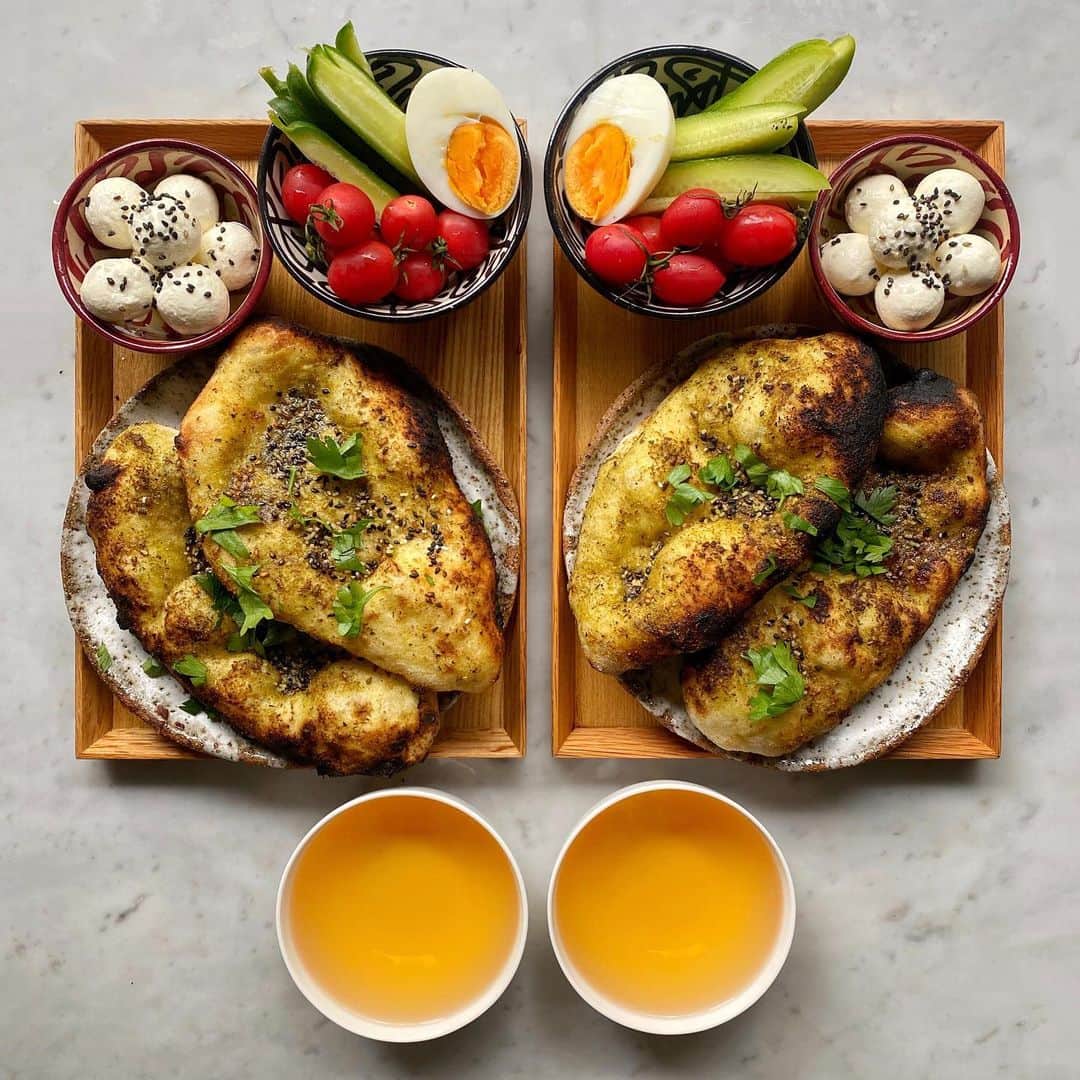 Symmetry Breakfastのインスタグラム：「#ad🔥 COMPETITION CLOSED! Congratulations to @dylanger11 enjoy your fabulous @oonihq ! 🔥  We’re gave away an Ooni Pro, Pro Gas Burner, 14” Wooden and Perforated Peel, Ooni Pizza Cutter and Ooni Pro Cover!  To enter, it’s simple: Follow me, @symmetrybreakfast, and my friends at @oonihq  Comment on either of our posts tagging a friend you would make pizza for! Tag as many friends in separate comments as you like - each comment counts as an entry!  Ts and Cs apply: link in bio. - - - - - - - - - - - - Delicious maneesh style breads, using a 72 hour pizza sourdough, fluffy charcoal cooked with plenty of labneh to smear over it. Delicious! #symmetrybreakfast」