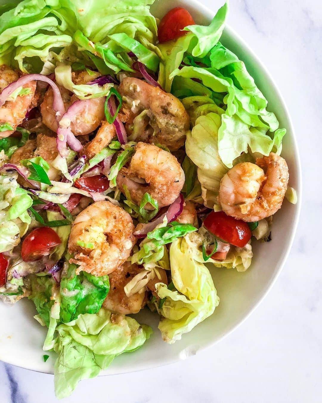 Flavorgod Seasoningsさんのインスタグラム写真 - (Flavorgod SeasoningsInstagram)「Spicy Shrimp Salad 🥗 ⁣⁠ ⁣-⁠ Customer:👉 @paleosnaps⁠ Seasoned with:👉 #Flavorgod Cajun Lovers Seasonings⁠ -⁠ KETO friendly flavors available here ⬇️⁠ Click link in the bio -> @flavorgod⁠ www.flavorgod.com⁠ -⁠ 𝘊𝘰𝘭𝘦𝘴𝘭𝘢𝘸 𝘮𝘪𝘹: green caggabe, red cabbage, thinly sliced red onion, 1/2 tspn sea salt & juice of half a lime. Mix and refrigerate for 30 mins. ⁣⁠ ⁣⁠ 𝘚𝘩𝘳𝘪𝘮𝘱: 1 lb shrimp, @flavorgod Cajun seasoning, 2 tspn olive oil (split), sea salt and fresh cracked pepper. ⁣⁠ • mix 1 tspn olive oil, shrimp and seasonings in a bowl • heat 1 tspn olive oil over medium and cook shrimp 3-4 mins on each side depending on size ⁣⁠ ⁣⁠ 𝘚𝘢𝘭𝘴𝘢 𝘋𝘳𝘦𝘴𝘴𝘪𝘯𝘨: mix 1/4 cup tomatillo salsa, 1 tbsp paleo mayo and @sietefoods jalapeño hot sauce. ⁣⁠ ⁣⁠ 𝘚𝘢𝘭𝘢𝘥: butter lettuce topped with cherry tomatoes, green onions, coleslaw mix, shrimp and salsa dressing. ⁣⁠ -⁠ Flavor God Seasonings are:⁠ 💥 Zero Calories per Serving ⁠ 🙌 0 Sugar per Serving⁠ 🔥 #KETO & #PALEO Friendly⁠ 🌱 GLUTEN FREE & #KOSHER⁠ ☀️ VEGAN-FRIENDLY ⁠ 🌊 Low salt⁠ ⚡️ NO MSG⁠ 🚫 NO SOY⁠ 🥛 DAIRY FREE *except Ranch ⁠ 🌿 All Natural & Made Fresh⁠ ⏰ Shelf life is 24 months⁠ -⁠ #food #foodie #flavorgod #seasonings #glutenfree #mealprep #seasonings #breakfast #lunch #dinner #yummy #delicious #foodporn」7月19日 8時00分 - flavorgod