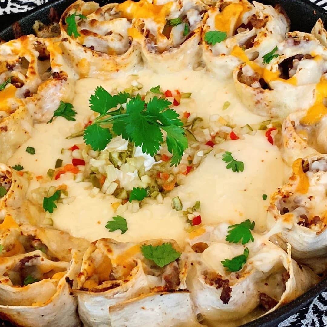Flavorgod Seasoningsさんのインスタグラム写真 - (Flavorgod SeasoningsInstagram)「Taco bites with creamy Queso⁠! Swipe right for photos▶️▶️ -⁠⠀ Customer:👉 @killerketocook⁠⠀ Seasoned with:👉 #Flavorgod Taco Tuesday & Ranch Seasonings!!⁠⠀ 📷 of taco Tuesday: @sangsterswoodstock4600 📷 of Ranch: @ponytailpower -⁠ Add delicious flavors to any meal!⬇⁠⠀ Click the link in my bio @flavorgod⁠⠀ ✅www.flavorgod.com⁠⠀ -⁠⠀ Taco Tuesday just got a little more fun with this super quick and easy taco skillet meal!⁠⠀ ⏰ Total Time: 20 minutes⁠⠀ 🍽Servings: 4⁠⠀ 🧀Ingredients:⁠⠀ 2 @cutdacarb flatbreads⁠⠀ 4oz Cream cheese⁠⠀ Meat if choice( I used leftover taco beef)⁠⠀ @flavorgod Ranch seasoning⁠⠀ @flavorgod Taco Tuesday blend seasoning (or any pepper based blend)⁠⠀ Shredded Cheese of choice⁠⠀ Premade queso cheese (enough to coat the bottom of your skillet)⁠⠀ Your favorite taco toppings(I used sour cream and @grillospickles pickle de Gallo).⁠⠀ Avocado oil⁠⠀ 🔥 Directions:⁠⠀ 1. Take your flatbreads and spread half the cream cheese over each. Add seasonings and meat. Sprinkle with shredded cheese.⁠⠀ 2. Roll the breads tightly length wise and cut into pinwheels (I got 16). Spray lightly with oil.⁠⠀ 3. Spray @lodgecastiron skillet with avocado oil and place pinwheels around the perimeter.⁠⠀ 4. Cover the bottom of the skillet with queso cheese and sprinkle some more mozzarella over the pinwheels.⁠⠀ 5. Preheat grill to medium/high and cook covered until cheese is bubbly and pinwheels are crisped.⁠⠀ 6. Remove from grill and top with some taco toppings and extra cheese if you want…⁠⠀ 7. ENJOY!!!!⁠⠀ ❤️This could also be done in the oven at 400* until bubbly and crisp.⁠⠀ -⁠⠀ Flavor God Seasonings are:⁠⠀ 💥ZERO CALORIES PER SERVING⁠⠀ 🔥0 SUGAR PER SERVING ⁠⠀ 💥GLUTEN FREE⁠⠀ 🔥KETO FRIENDLY⁠⠀ 💥PALEO FRIENDLY⁠⠀ -⁠⠀ #food #foodie #flavorgod #seasonings #glutenfree #mealprep #seasonings #breakfast #lunch #dinner #yummy #delicious #foodporn」7月19日 9時30分 - flavorgod
