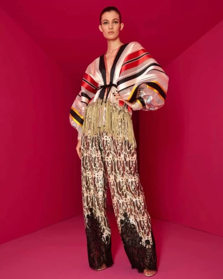 アレクシマビーユのインスタグラム：「Bayadère & lepard mood @alexismabille #hautecouture attitude @louiselefebure shot @julietrannoy hair @marcorsatelli makeup @lloydsimmondsmakeup cast @cococasting decor @beaubowparis #bayaderestripes #bayadere #lepardsequins #embroidery #lepard #gatopardo #alexismabille #blouse #pant #embroideredpant #embroidery #widepant #attitude #lookoftheday #colors #colortherapy」