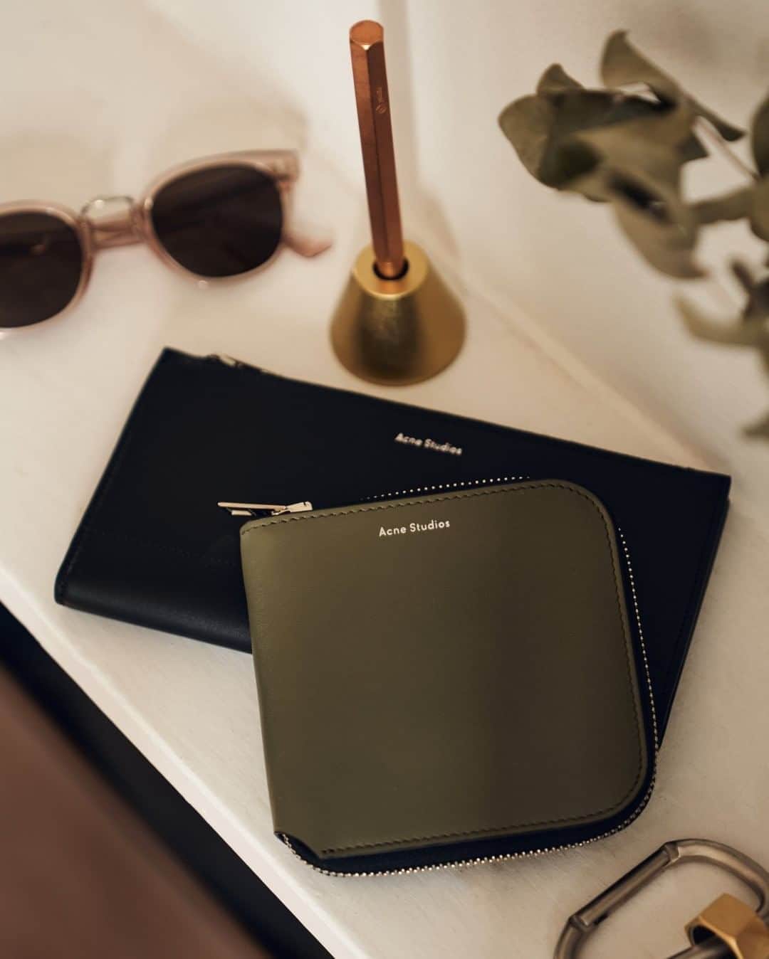 MR PORTERのインスタグラム：「If you're someone who still likes to carry a bit of cash around, @acnestudios' leather zip-around wallet is the right choice. It's fitted with plenty of credit card slots, a sleeve for bills and a snap-fastening pouch for loose change. Plus, it looks rather slick too. Head to the link in bio or tap to shop. #MRPORTER  🛍️ Acne Studios - Leather Zip-Around Wallet and Acne Studios - Leather Travel Wallet」