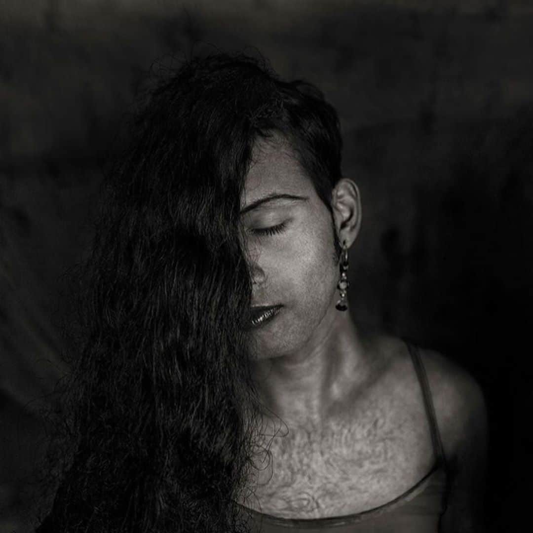 トームさんのインスタグラム写真 - (トームInstagram)「The semi-sacred ‘third gender’ of South Asia ( @shahria_sharmin) (By Fiona Macdonald 2017 @bbc)   “I feel like a mermaid. My body tells me that I am a man but my soul tells me that I am a woman. I am like a flower, a flower that is made of paper. I shall always be loved from a distance, never to be touched and no smell to fall in love with.” Heena, 51, (9) is a hijra: a term, according to Bangladeshi photographer #ShahriaSharmin, that has “no exact match in the modern western taxonomy of gender”.  Sharmin [was] chosen by @magnum for...her images of hijra communities in Bangladesh and India. “They are often mislabeled as hermaphrodites, eunuchs, transgender or transsexual women in literature,” Sharmin tells BBC Culture, arguing that “hijras can be considered to fall under the umbrella term transgender, but many prefer the term third gender”. She describes hijras as people designated as male at birth but with feminine gender identity, who eventually adopt feminine gender roles. When Mohona (29) turned 10, identifying as female, her father locked her up for three years to hide her. She broke out and eloped, ending up in Delhi (Slide 8) Sharmin’s images are deeply personal portraits – often revealing a level of intimacy that can be difficult to reach between photographer and subject. She refers to the process of taking their pictures as “slow and time-consuming”, explaining: “I never rush. Normally I spend considerable time with a particular subject and most of the time I don’t even shoot. I hang around with them for the whole day.”  Poppy (47, left) and Kesri (45, right) left their families years ago, but they have found a friendship that is close to replacing unconditional love (slide 1) For many hijras, that community has come to replace their family – and it has a defined group structure. “Hijras have developed a culture where they live under a guru who provides them with social safety, shelter, and basic necessities in exchange for money and in some cases, recognition,” says Sharmin. “They start to nurture a family with a leader almost like a sorority house. Their daily earnings are all collected by the guru who then provides them with their necessities...」8月14日 22時55分 - tomenyc