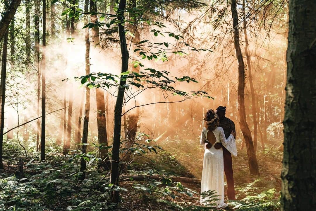 ミナのインスタグラム：「Secret, magical escape 😍⁠ ⁠ Venue: @longtonwood ⁠ Photography & Concept: @kirstymackenziephotography ⁠ Stylist, Props & Concept: @toasthq ⁠ Flowers: @_anniefern_ ⁠ Cake: @avantgardecakestudio ⁠ Stationery: @sundownpaper ⁠ Crochet Dress: @indiebride.london ⁠ Hat: @gigipip ⁠ Suits: @greshamblake ⁠ Real Couple: @theroyalcouple_sj @_savannadarnell @iamtheroyalguard ⁠ Headpiece & Button hole: @f.o.l.k.y.d.o.k.e.y ⁠ Bridal Accessories: @thevamoose ⁠ Vegan Grazing Table: @gracefully_grazing ⁠ Hair & Make-up Advice: @joyceconnormakeup ⁠ Tableware: @elvis_robertson_ceramics ⁠ Glassware & Table Hire: @placesettings_ ⁠」