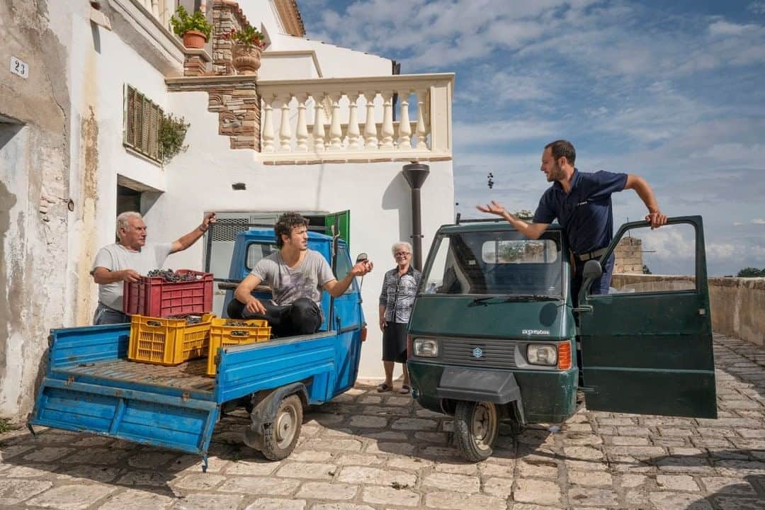 National Geographic Travelさんのインスタグラム写真 - (National Geographic TravelInstagram)「Photo by @andrea_frazzetta  A daily life scene on the streets of Grottole, a small village in Basilicata in southern Italy. Young and old share a love for this hilltop town and for the countryside that surrounds it, which still has the rhythm of a life in balance with the land and agriculture. While in recent decades these villages have suffered inexorable abandonment, recently the new generations are returning to inhabit these places.  To see more photos from my travels, follow me @andrea_frazzetta. #italy #basilicata」8月15日 1時06分 - natgeotravel