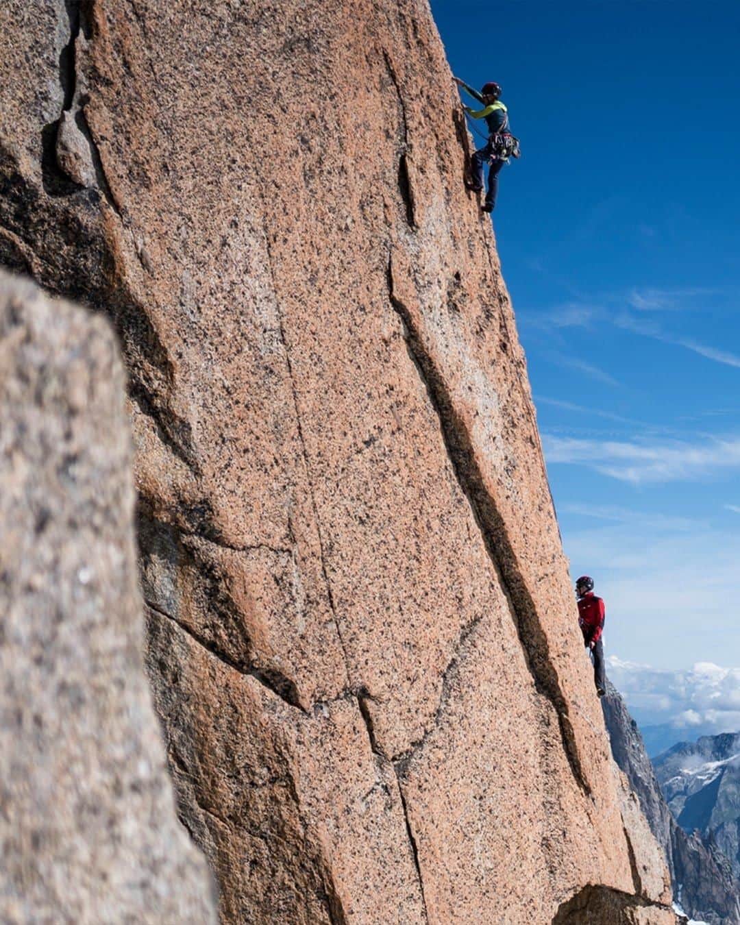 ミレーのインスタグラム：「@lionelpernollet from @compagniedesguidesdechamonix could have picked a worse place to climb. Stunning scenery at Pointe Adolphe Rey.  📷 @dam_tomasi  #MilletRiseUp」