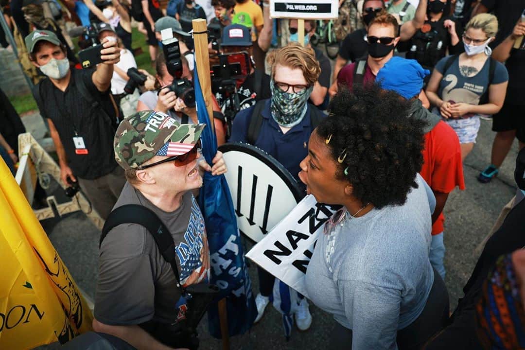 NBC Newsさんのインスタグラム写真 - (NBC NewsInstagram)「A woman argues with a far-right protester during a rally on Saturday, near the downtown area of Stone Mountain, Georgia. Tap the link in our bio for more.  📷 @lnweatherspoon / @gettyimages」8月16日 4時50分 - nbcnews