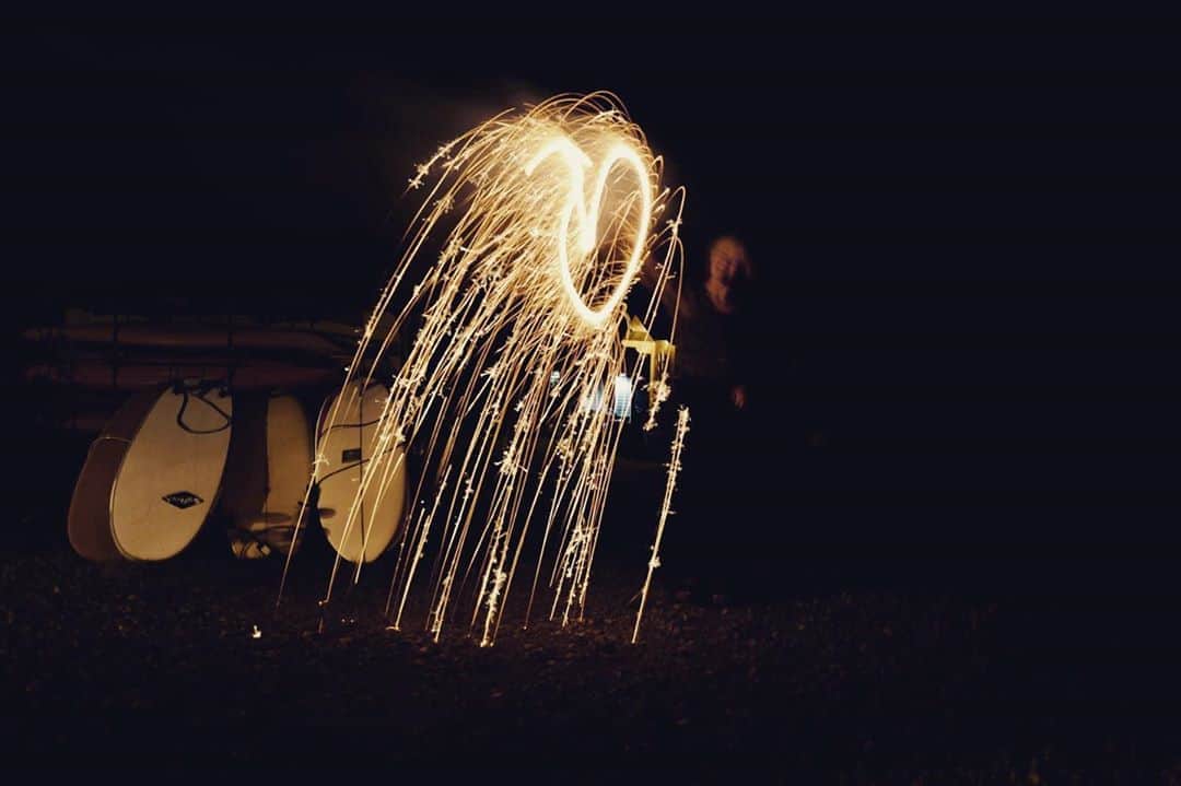 藤田敦子のインスタグラム：「ㅤ  small fireworks🎆💛 亡霊のような自分😅 ㅤ Photo by @supermeinc ㅤ #surf #surfcamp #surfing #花火」