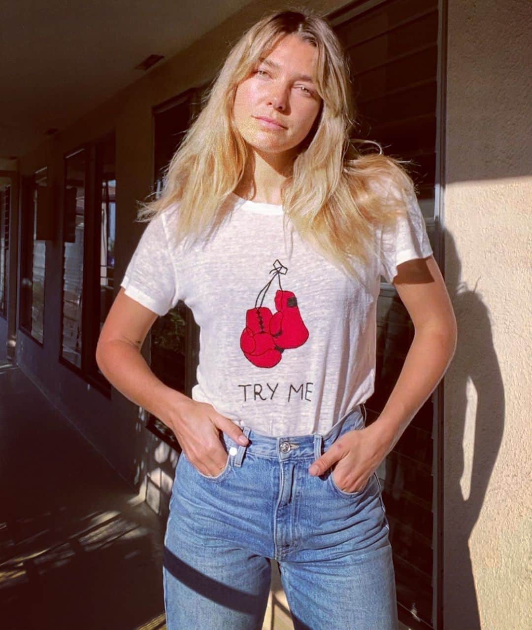 アシュリー・ハートさんのインスタグラム写真 - (アシュリー・ハートInstagram)「I feel pretty unshakable in following this heart of mine, which is a feeling that’s developed over time. People pleasing was a language I wore so close, I didn’t realize it was even being spoken. I think one of the most rewarding aspects about maturity is learning to truly listen to ourselves, feeling into our own deep Truths, and integrating what we find. Beyond “right” and “wrong,” there is the perfect rhythm of our own hearts.   This @banner_day ‘try me’ shirt represents that “solid-in-the-Self” feeling.  Try Me! Tell me what you believe, what you want for me, what you think is right and wrong. I’m ready, strong, unshakable, liberated in the loving ‘no’. Do you feel this? This feeling in myself continues to grown and refine itself, but boy does this shirt make me feel Heart strong.. especially with my stance on Eco-Concious fashion!  #tryme #sustainablefashion #handstritched #madewithintention」7月25日 0時45分 - ashleyhart