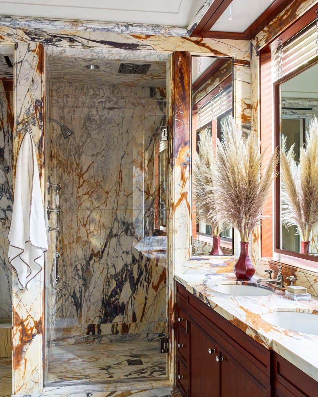 ELLE DECORさんのインスタグラム写真 - (ELLE DECORInstagram)「The walls, shower, and counters in the main bath of a Fifth Avenue apartment, designed by @katieridderinc and architect @peterpennoyerarchitects, are in a striking Calacatta Paonazzo marble, bringing a gorgeous sense of serenity into the space. The shower head and fittings are by @wtrwrks, and the rain shower head and sinks are by @kohler. Click the link in bio for the full tour as seen in our Summer 2020 issue. Photography by @ericpiasecki.」7月26日 5時00分 - elledecor
