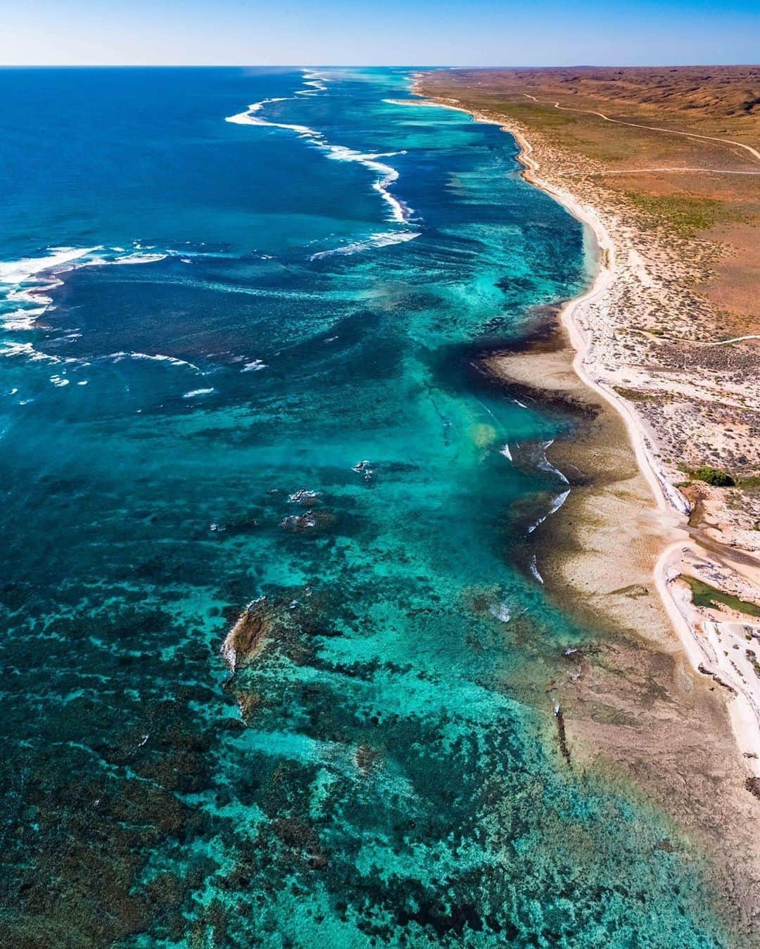 Australiaさんのインスタグラム写真 - (AustraliaInstagram)「The colours of @westernaustralia’s #NingalooReef are mesmerising, aren’t they? 💙 Perth-based photographer @scottslawinski heads up to this part of @australiascoralcoast so often, he’s practically a local. It’s a scenic two-day drive from @destinationperth, or you can fly to #Exmouth. If you choose to fly, you’ll need a hire car to get around - the Cape Range National Park (pictured here) has plenty of secret nooks to discover so you’ll want to take your time exploring this World Heritage-listed slice of heaven. #seeaustralia #thisiswa #wanderoutyonder #australiascoralcoast」7月26日 20時00分 - australia