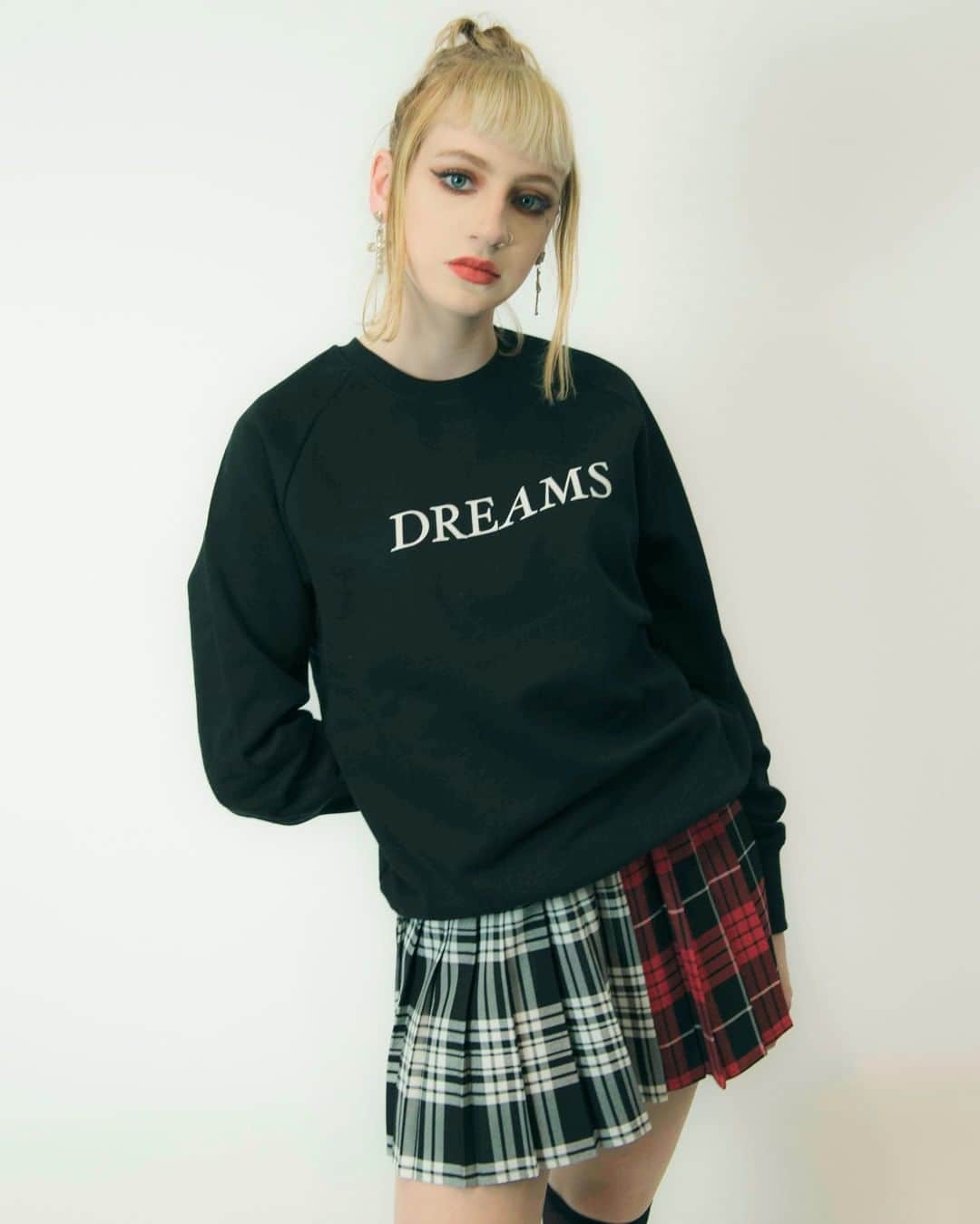 のインスタグラム：「Amber wears the Dreams jumper and Barrowlands Tartan skirt.⁠  All of our Tartan skirts are hand-pleated in the UK using Authentic Tartan. Not mass-produced in a sweatshop, hand-produced in a workshop.⁠ ⁠ Sensible and sustainable production⁠ ⁠ From our online store.⁠」