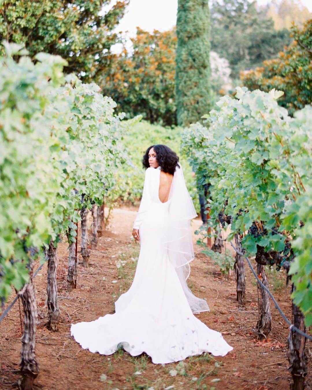 Harper's BAZAARさんのインスタグラム写真 - (Harper's BAZAARInstagram)「Stacia Harris (@stacialynndavis) and Mario Davis’ (@mariocdavis) Napa Valley wedding is all the inspiration you’ll need for an intimate celebration outdoors. Their love for good food, fine wine, fashion, and time spent with family and friends was the recipe for a stunning, effortless, and romantic wedding weekend in California’s wine country. “Napa Valley has always been a special place for us,” Stacia explains. “Not only was it where we took our very first out-of-town trip when we began dating, but it was also my first visit to wine country. We decided on a private estate for intimacy. It’s tucked away on the edge of a mountain in Calistoga, California, with sweeping views over the valley and mountains.” ⁣ ⁣ Though the couple never worked social distancing into their wedding planning—it was 2019 after all—their choice to host an intimate dinner party and forgo an after-party is a prime example of how one could achieve a small, safe wedding outdoors—if, where, and when gatherings are permitted. See more photos from their beautiful day at the link in our bio.⁣ ⁣ Photographs by @featherandstonephotography⁣ Gown by @moniquelhuillier」7月27日 0時42分 - harpersbazaarus