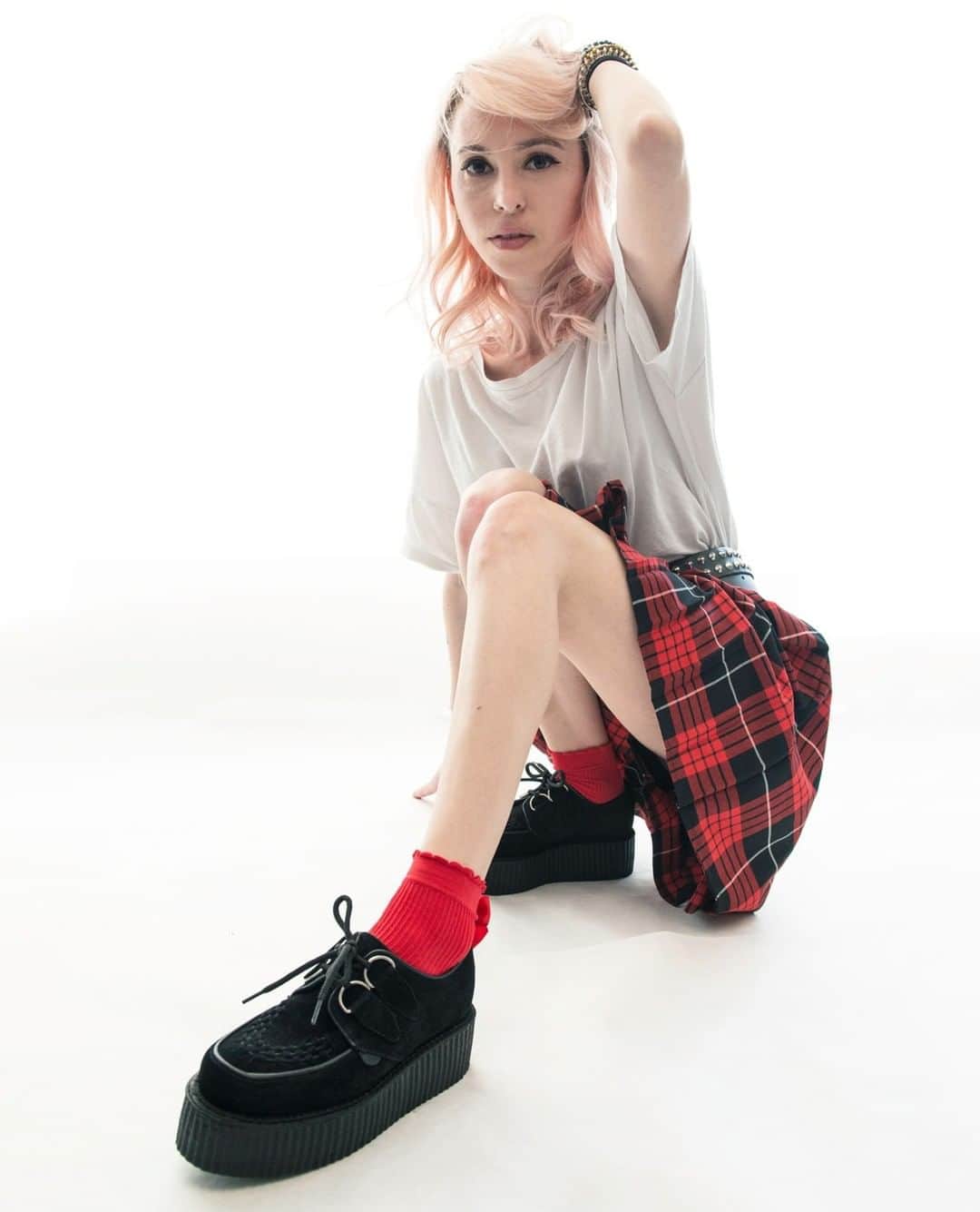 のインスタグラム：「Roxana wears the Original Wulfrun Creeper- this double sole version of our classic in black suede on a double sole.⁠  The Mono skirt in Authentic McQueen Tartan and the Creepers can be shopped on our online store.⁠ ⁠ ⁠ ⁠ **Step by step we work to improve our environmental footprint. As an independent company we can use our freedom to select products from ethical and local suppliers and we are able to commit to small batch production.**⁠ ⁠」