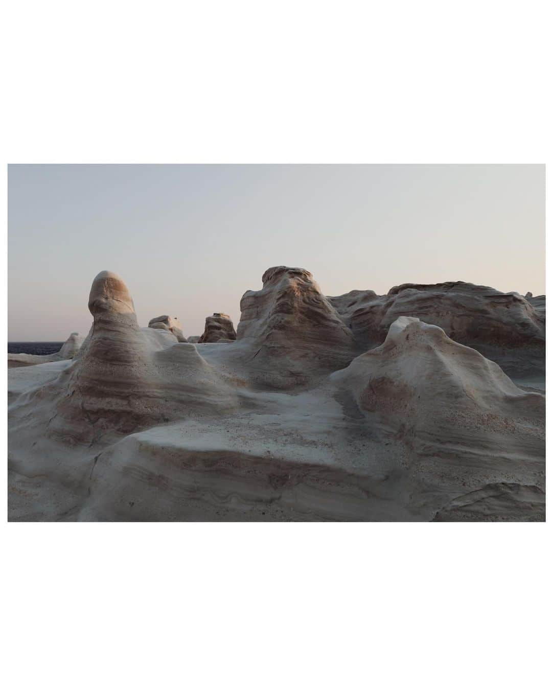 アーネスト・グリーンさんのインスタグラム写真 - (アーネスト・グリーンInstagram)「If you’ve ever wanted to experience what it would feel like to walk on the moon - you should think about visiting Sarakiniko Beach in Milos, Greece.  Coastal winds have shaped the grayish-white volcanic rock into amazing, other-worldly shapes - and visiting at sunrise / sunset turns the rock an amazing pinkish color that is really striking. It felt like an appropriate location for shooting a lot of the press photos for PN - as while it feels Mediterranean - it also is unlike any other place on earth.  All photos shot by my beautiful wife.」7月27日 4時35分 - realwashedout