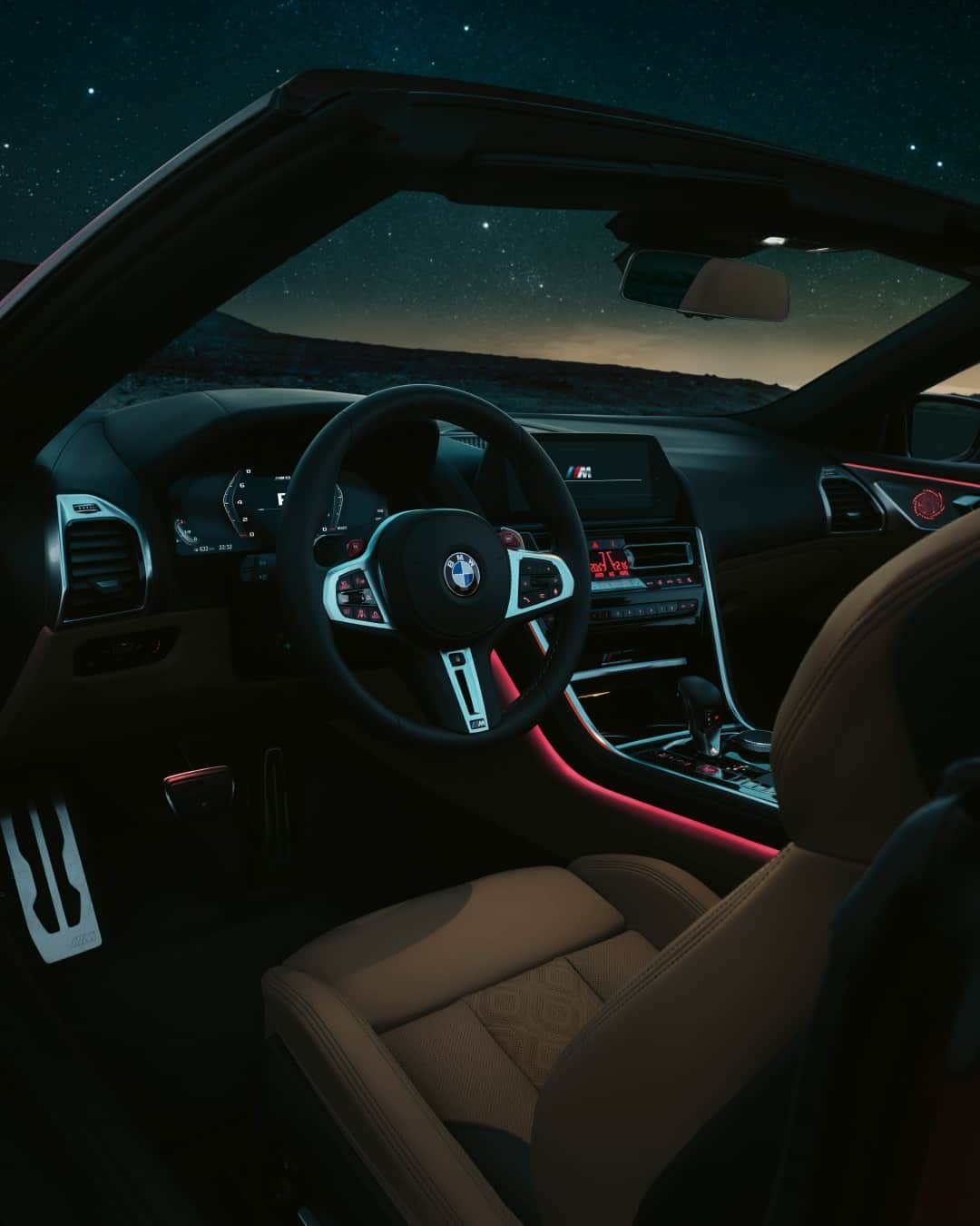 BMWのインスタグラム：「Engineered for driving, not just sitting. Just perfect inside and out. BMW M8 Competition Convertible. #TheM8 #BMW #M8 @BMWM  __ BMW M8 Competition Convertible: Fuel consumption in l/100 km (combined): 10.8. CO2 emissions in g/km (combined): 246. Further information: www.bmw.com/disclaimer.  	 Acceleration (0-100 km/h): 3.3 s. Power: 460 kW, 625 hp, 750 Nm. Top speed (limited): 250 km/h (with optional M Drivers Package: 305 km/h).」