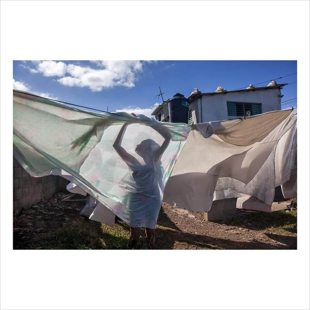 Magnum Photosさんのインスタグラム写真 - (Magnum PhotosInstagram)「“Baracoa was the first city founded in Cuba. In 2011 it celebrated its 500th anniversary. It is located in the northeastern area of the province of Guantánamo, close to Haiti. Difficult to access, surrounded by mountains, rivers and the sea, with plenty of vegetation that makes it a place of extreme natural beauty, the city is a national monument; its inhabitants, located far away from Cuba’s tourism hubs, are entrepreneurs, friendly and welcoming. The city is located in an area that has been stricken by hurricanes. ⁠ ⁠ In 2008, Hurricane Ike penetrated up to 400m inland, destroying the city’s market and many houses on the shore. Hurricane Sandy in 2012, and Hurricane Matthew in 2016 — the most powerful, with winds of 220 km/h— devastated the city, leaving much of it in ruins. Then, again, in 2017, Hurricane Irma caused significant damage. It is a historic city, fragile and wounded by natural disasters.”– Cristina Garcia Rodero⁠ .⁠ This is a unique opportunity to purchase signed or estate-stamped prints by over 100 of the world’s leading photographic artists in an exclusive 6x6” format for $100.⁠ .⁠ Solidarity, the July Magnum Square Print Sale, in support of the @naacp and in collaboration with @voguemagazine, is live until Sunday, at the link at bio.⁠ .⁠ Magnum photographers and Vogue are both donating 50% of their proceeds to the National Association for the Advancement of Colored People (@naacp), the longest-running, and largest civil rights organization in the United States.⁠ .⁠ The NAACP’s mission is to eliminate race-based discrimination and uphold equality of rights of all persons.⁠ .⁠ Visit the link in bio to see all the images available.⁠ .⁠ PHOTO: Canvas in the wind. Baracoa, Cuba. 2010.⁠ .⁠ © #CristinaGarciaRodero/#MagnumPhotos⁠ ⁠ #MAGNUMSQUARE #Solidarity #printsale」7月28日 2時45分 - magnumphotos