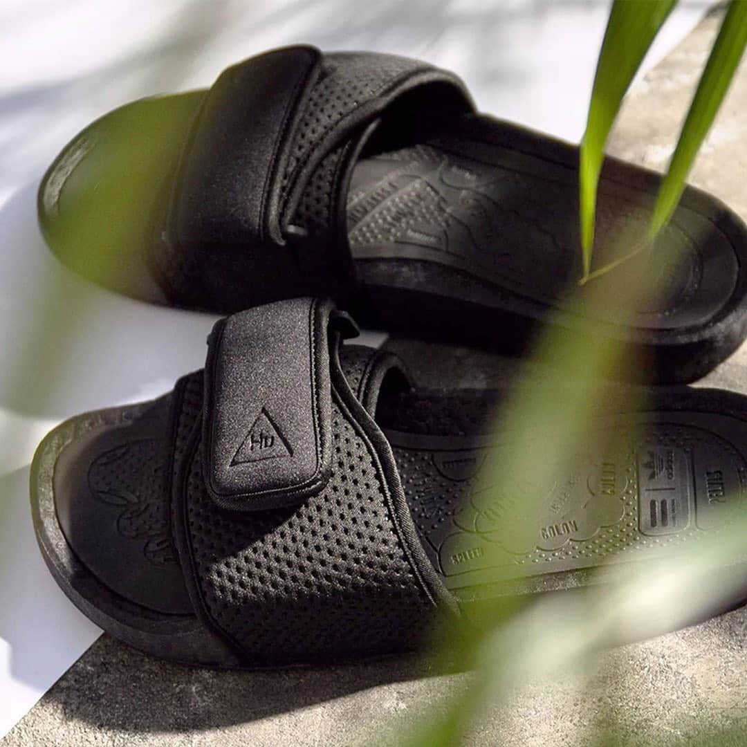 HYPEBEASTさんのインスタグラム写真 - (HYPEBEASTInstagram)「@hypebeastkicks: @pharrell and @adidas keep it comfy with its new BOOST-filled slides perfect for the summer. Prepared in tonal orange, black and yet-to-be-revealed pink colorways, each slide manages to pack a substantial amount of detail into its stripped-back build and promises the signature full-foot comfort associated with bouncy BOOST foam. Pick up a pair at retailers like @asphaltgold_sneakerstore for approximately $116 USD on August 1.⁠⠀ Photo: Asphalt Gold」7月28日 8時01分 - hypebeast