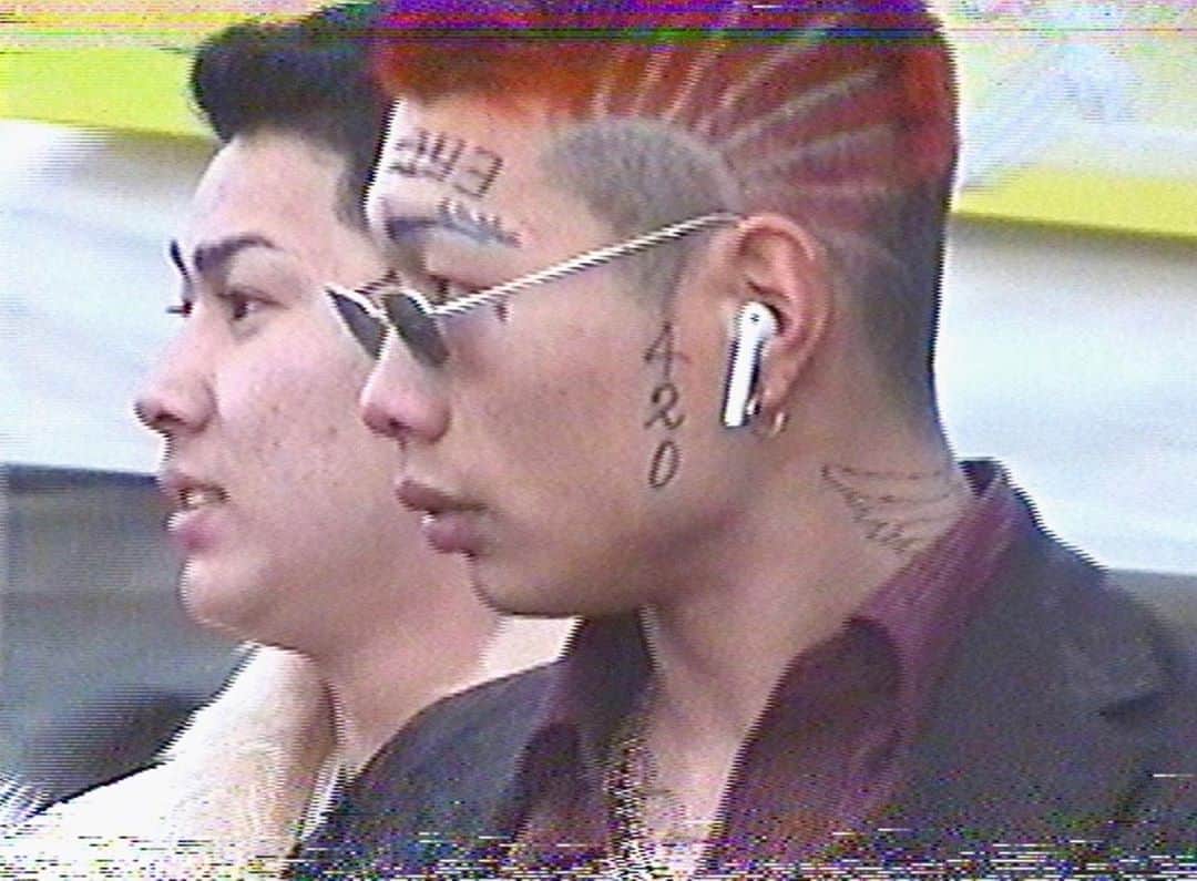 東京DANDYのインスタグラム：「Face tatt’s and AirPods. A still from my trip to Kita Kyushu for the ‘Coming of Age’ ceremony. We hope the rain stops and the sun starts shining for our friends in Kyushu and across Japan affected by the unprecedented rains.」