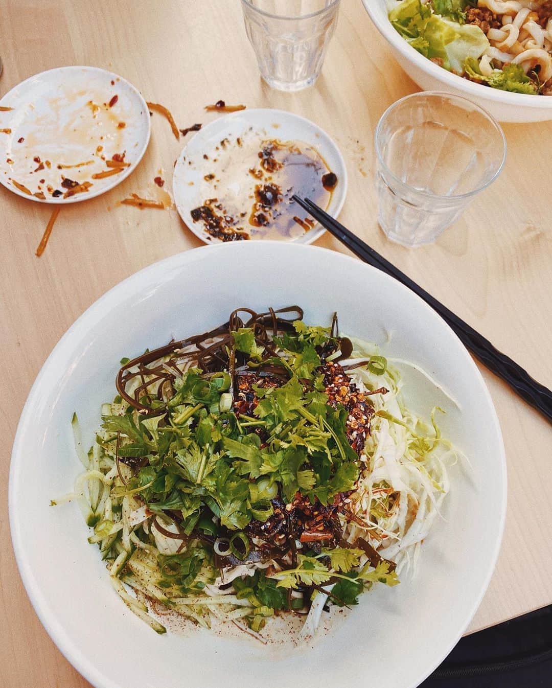 STIL IN BERLINのインスタグラム：「The cold, vegan noodle dish at @chungkingnoodles last night - so refreshing while so spicy and crispy and cilantro-y. This place is one of my very favs in Berlin (not a secret) and I'm so proud of my friend Ash Lee pushing through and making this dream of hers a reality. It's obviously also in my Best of Berlin 2020 Guide, which you can immediately download via the link in bio for 4,90€. PS, always stir, stir, stir very well.  #chungkingnoodles # berlinfood #foodinberlin #berlinrestaurant #berlinfoodguide #berlinfoodie」