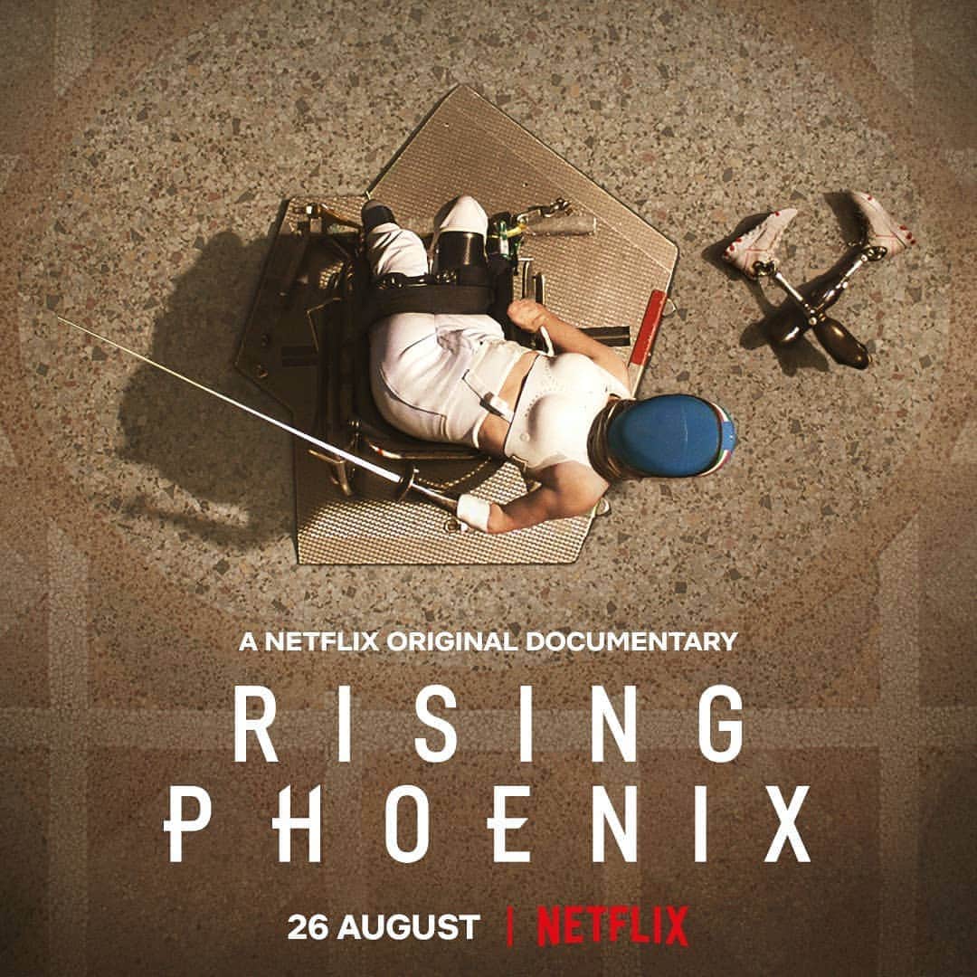 ベアトリーチェ・ヴィオのインスタグラム：「9️⃣ incredible real stories to celebrate the magic paralympic world. 🦾 And still i don't understand why they call me 🤔😜 #RisingPhoenix: August 26th on @netflix @netflixfilm @htyt.stories . . . Bebe Vio, a light skinned quadruple amputee woman wearing a fencing mask, is seated in her manual push wheelchair, holding her fencing foil and looking upwards at the camera above. Her prosthetic limbs are next to her on the gravely ground. White text near the bottom at the photo reads “A Netflix  Documentari, Rising Phoenix. Aug 26. Netflix” . . .  #Netflix #NetflixFilm #Paralympics #ProudParalimpian」