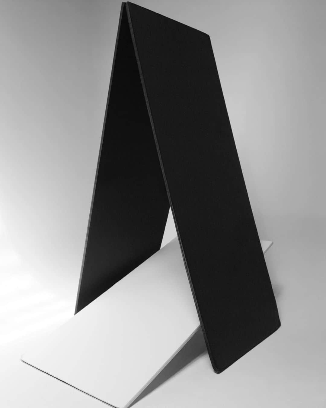 ブライアン・アダムスのインスタグラム：「At one of my photoshoots last year, here is an improvised sculpture made of boards from the studio. Trying it out is @sashaluss who was styled by @joanneblades for @zoomagazine」