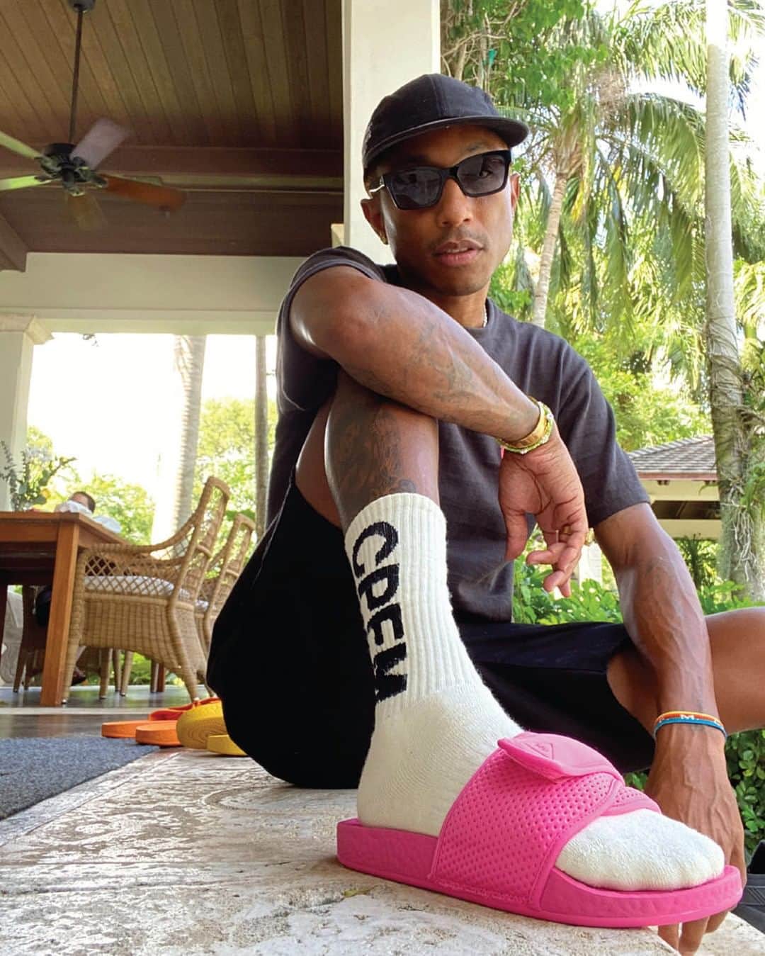 Vogueさんのインスタグラム写真 - (VogueInstagram)「@Pharrell Williams wants you to know that his latest collaboration with @Adidas, a pair of PW Boost Slide sandals, is exceptionally comfortable. Not just cushy or foamy, but more like a cloud kissing your heel. Or maybe like your arches are being cradled by the baby-soft hands of a thousand cherubs. Williams himself likens the sensation quite simply to “wearing socks.…You don’t even think about it anymore.”  Tap the link in our bio for all details.」7月30日 5時01分 - voguemagazine