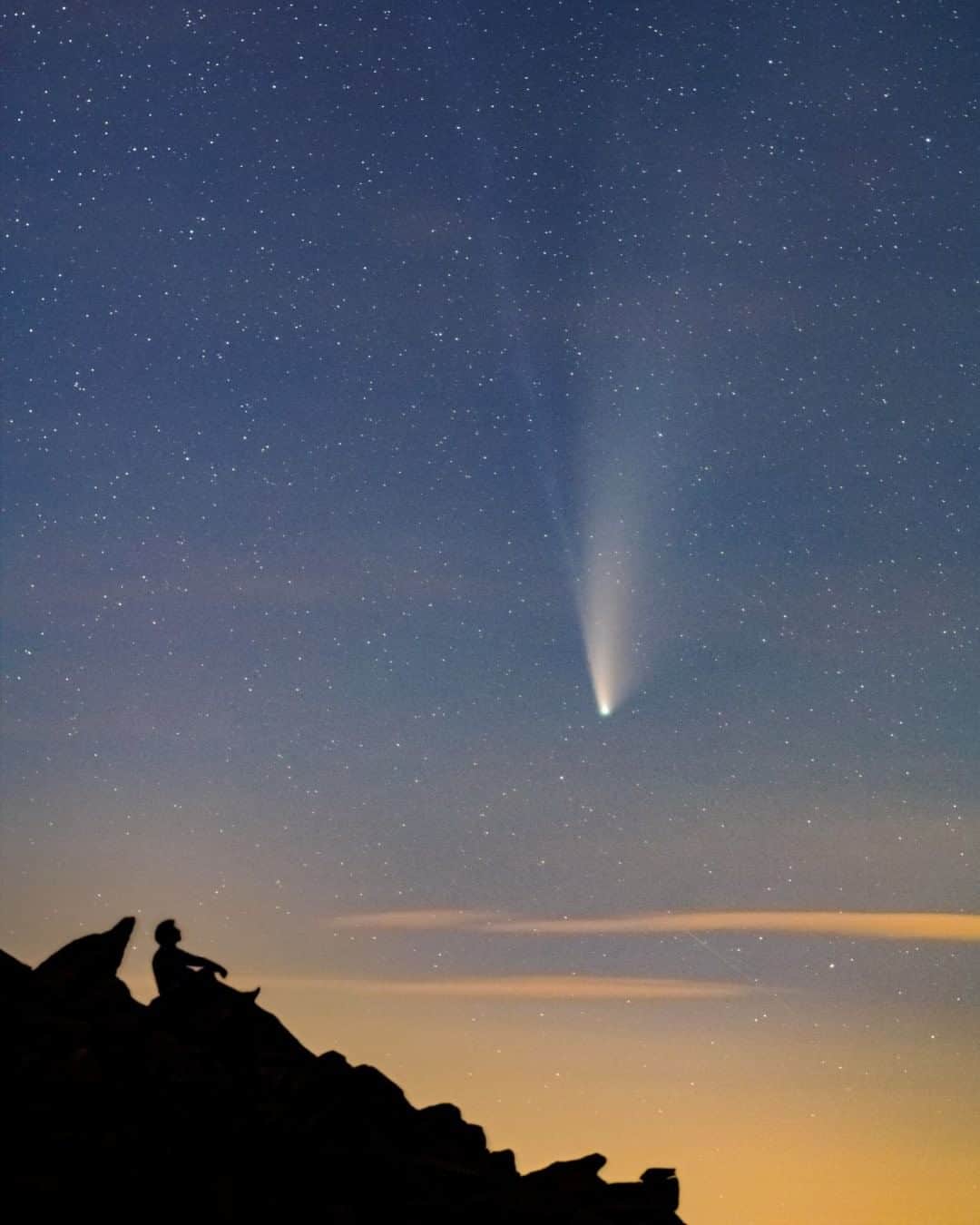 National Geographic Travelさんのインスタグラム写真 - (National Geographic TravelInstagram)「Photo by @babaktafreshi  A prominent comet that becomes visible to the naked eye passes by the Earth every decade or so. This month comet NEOWISE put on a beautiful show after surviving solar heat and radiation. It was fainter to the eyes than this telephoto image through a 135mm lens, but it was still a beautiful sight under dark skies. Here I was about 30 miles (48 kilometers) north of Boston at Halibut Point State Park, overlooking the ocean. I photographed the comet before it disappeared in the far glow of coastal towns in New England. The comet is now on its long way back to the outer solar system or interstellar space.  Explore more stargazing destinations and ideas with me @babaktafreshi. #twanight #comet #stargazing #newengland #boston」7月31日 5時06分 - natgeotravel