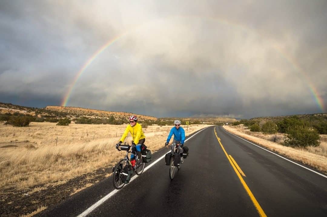 National Geographic Travelさんのインスタグラム写真 - (National Geographic TravelInstagram)「Photo by @michaelclarkphoto  Patrick O'Grady and Owen Haggard bicycle just south of Grants, New Mexico. At this moment the major bicycle companies have sold out of many bikes and are working incredibly hard to build more. With COVID-19 locking down gyms here in the United States, getting out on a bike has become a major source of exercise for many. At the start of my career, I spent six months bike touring around France. It was one of the best extended trips I have ever done. In my opinion, there is no better way to see the world than from a bicycle. #adventurebiking #biketouring #newmexico」8月2日 9時05分 - natgeotravel