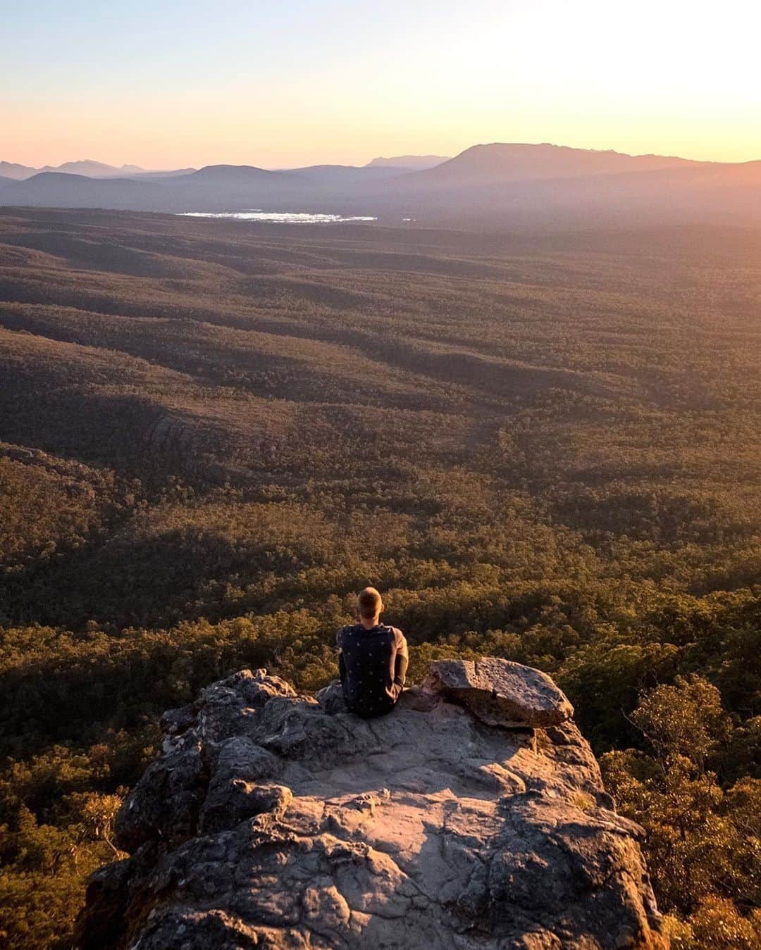 Australiaさんのインスタグラム写真 - (AustraliaInstagram)「Feeling on top of the world at #BorokaLookout in @thegrampians ⛰️ @tavishhhphoto captured this impressive shot at one of many breathtaking vantage points in the #Grampians region of Victoria, which is famous for its rugged scenery and mountainous terrain. @journeybeyondrail’s #TheOverland rail experience is a great way to explore this region - put your feet up and witness the stunning landscape between #Adelaide and #Melbourne with its biweekly services planned to recommence from 14 September 2020. #visitvictoria #grampians #JourneyBeyond」8月2日 20時00分 - australia