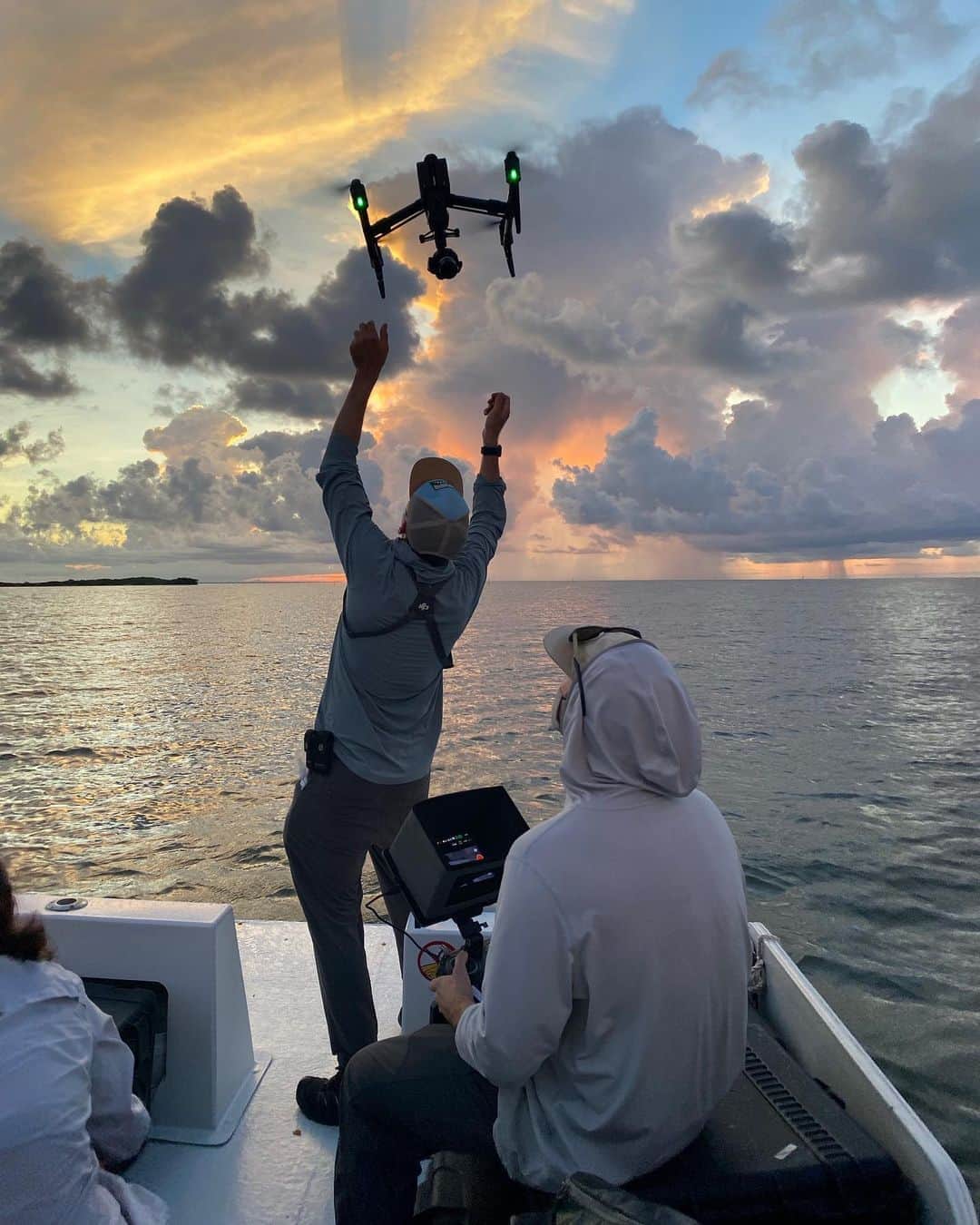 National Geographic Creativeさんのインスタグラム写真 - (National Geographic CreativeInstagram)「Photo and video by @carltonward. Sunrise over the Gulf of Mexico in Cedar Key, FL. @ricksmith_media catches his drone with @morth_photo at the controls after a sunrise flight. Cedar Key is a historic fishing community near the mouth of the Suwannee River. Because of optimal estuary conditions, Cedar Key is now one of America’s leading producers of clams. We’re working on a Last Wild Places film about the Florida Wildlife Corridor for @insidenatgeo. Please stay tuned over the next two weeks. Next stop: the Peace River Valley. @fl_wildcorridor #KeepFLWild」8月17日 20時39分 - natgeointhefield