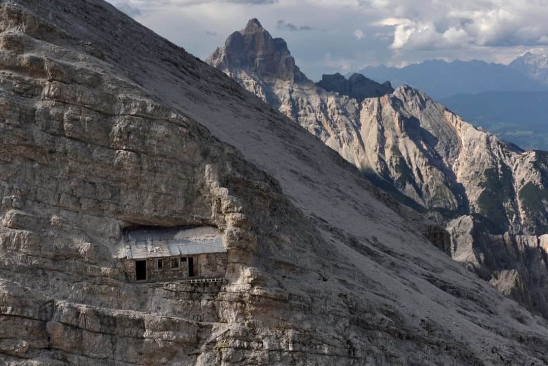 National Geographic Travelさんのインスタグラム写真 - (National Geographic TravelInstagram)「Photo by Robbie Shone @shonephoto  The wartime ruins that line many of the via ferratas in the Italian Dolomites are incredibly well hidden—and with good reason. They were designed to be difficult to find and (ideally) impossible to conquer. The effort it must have taken to transport building materials to these high and remote ridges is hard to imagine, but the hard work would still have been preferable to the idea of being vulnerable to enemy attack. The Ivano Dibona via ferrata is a restored historical route used by Italian troops during World War I.」8月3日 9時04分 - natgeotravel