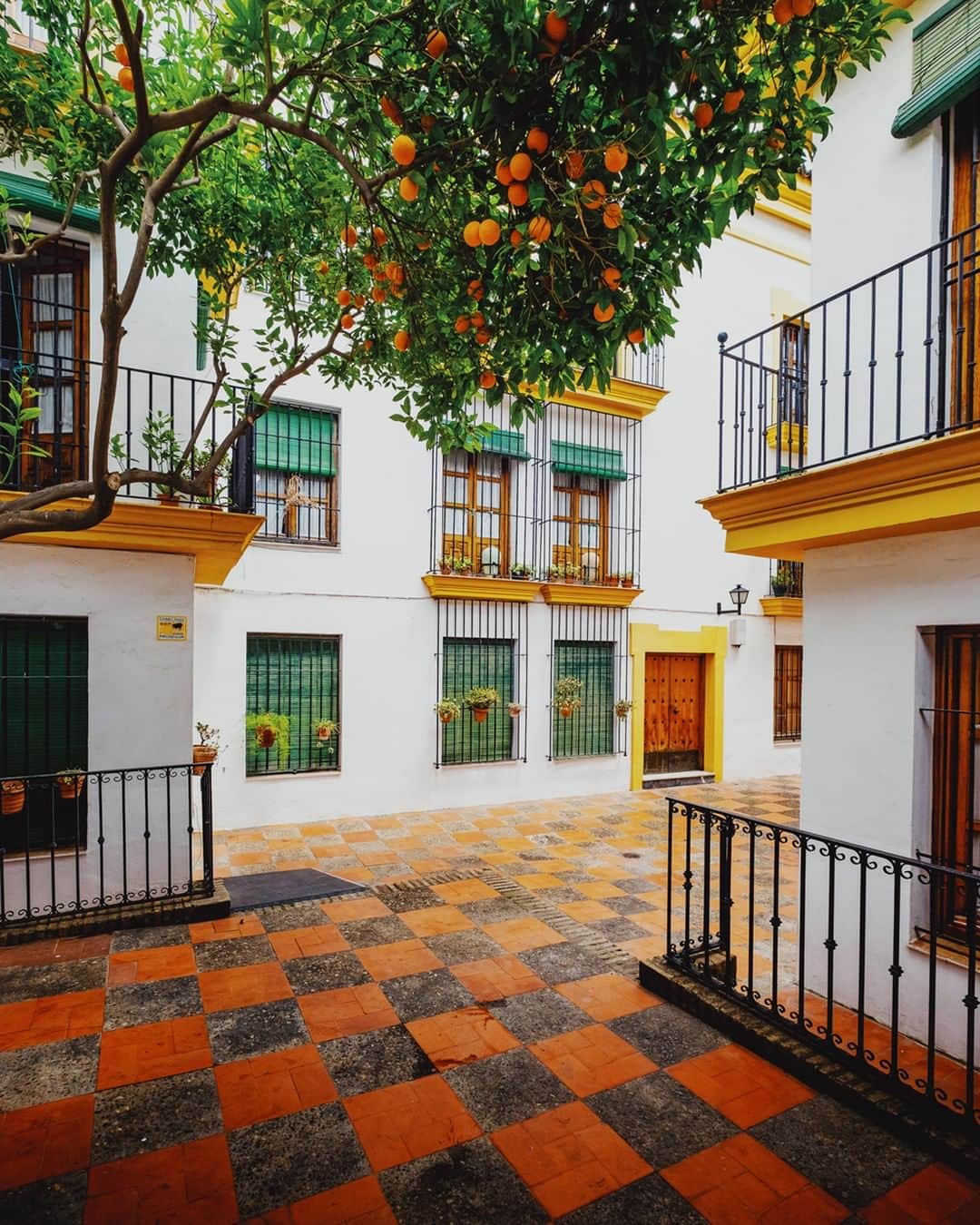 Fujifilm UKさんのインスタグラム写真 - (Fujifilm UKInstagram)「FEATURED PHOTOGRAPHER OF THE WEEK  “On a bright and sunny afternoon, my wife and I found ourselves in the Jewish Quarter of the Spanish city of Seville. At one of the squares this delightfully orange themed courtyard caught my eye through a small gap in the gate. The chequered floor patterns made for a vibrant foreground that leads the viewer into the scene. A scene that is nicely completed with addition of a classic Seville orange tree to frame the whitewashed courtyard.” - @poetic_mouse.  FUJIFILM X-E3  XF10-24mmF4  F5.6  ISO 500| 1/250 sec  #Fujifilm #XSeries #XE3」8月5日 0時00分 - fujifilmuk