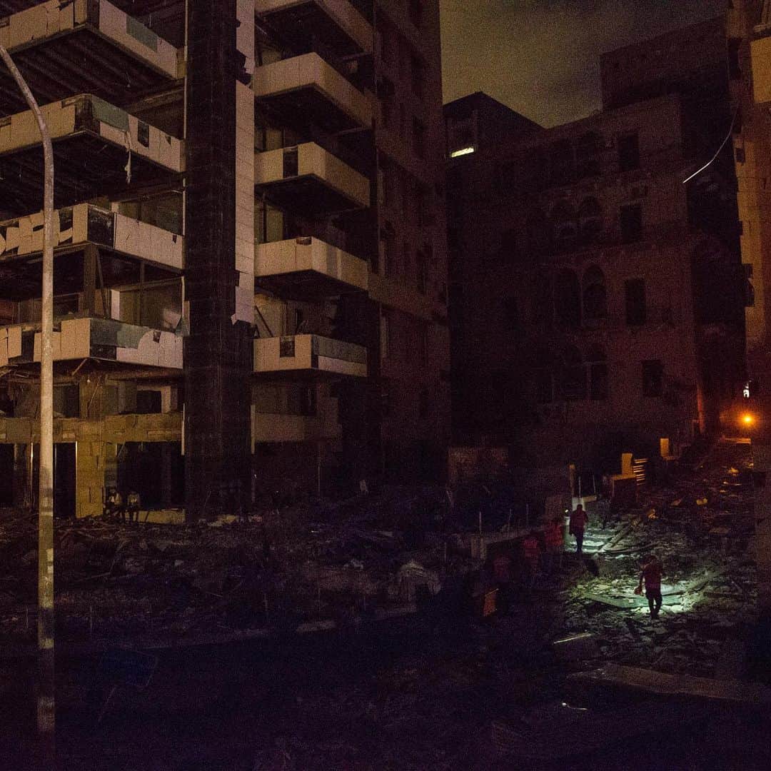 TIME Magazineさんのインスタグラム写真 - (TIME MagazineInstagram)「Dozens of people were reported dead and more than 4,000 were injured across Beirut on Aug. 4, according to officials cited by the Associated Press, after a massive explosion at the port of the Lebanese capital became the latest calamity in a country grappling with the coronavirus pandemic and an extended financial crisis. Homes were reduced to rubble, cars were overturned on streets littered with glass and other debris, and hospitals were overwhelmed as rescuers searched for survivors. The cause of the explosion remains unclear but Lebanon's general security chief said confiscated explosive material was being stored at the port, the AP adds. In these photographs: wounded people receive treatment at a hospital parking lot; debris litters a main road at sunset; the interior of a damaged house; a bloodied man places a cloth to his head on a destroyed street; and rescue crews search for survivors. Photographs by Marwan Naamani—picture alliance/@gettyimages, @marwan.tahtah—@afpphoto/@gettyimages, Nabil Mounzer—@epaphotos-EFE/@shutterstock, @marwan.tahtah—@afpphoto/@gettyimages and @danielcardephoto—@gettyimages」8月5日 14時55分 - time
