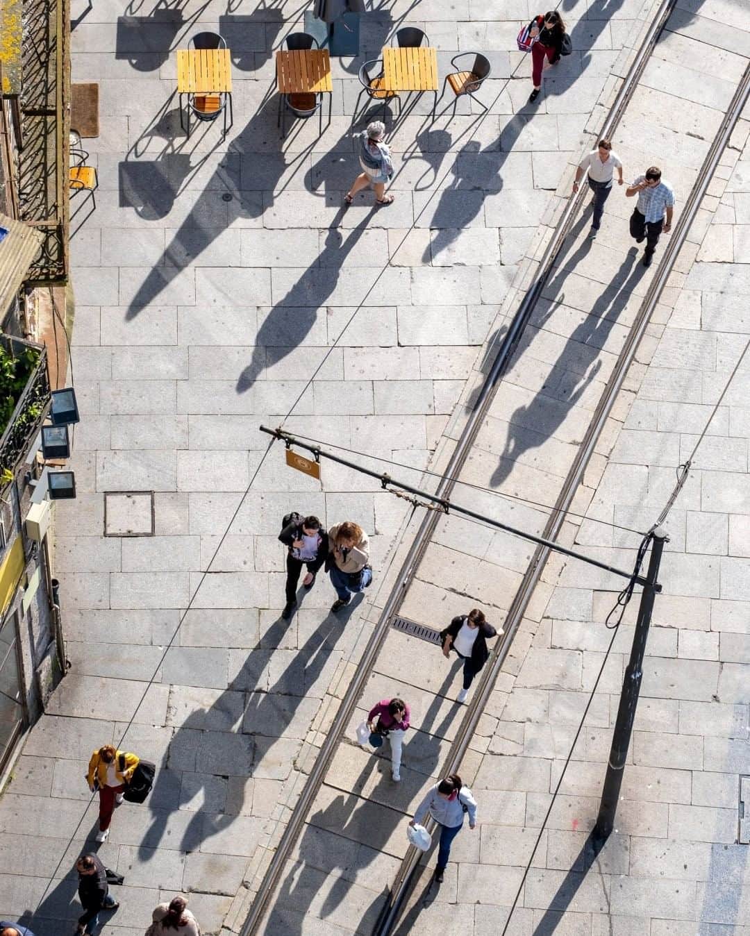 National Geographic Travelさんのインスタグラム写真 - (National Geographic TravelInstagram)「Photo by @KristaRossow  Last year in Porto, I climbed to the top of the Clérigos Tower just before it closed for the day. I nearly had the entire platform to myself, and the late afternoon sun made for long shadows of the people passing by and a graphic composition. For more images from around the world, follow me @KristaRossow. #Portugal #Porto」8月5日 21時08分 - natgeotravel