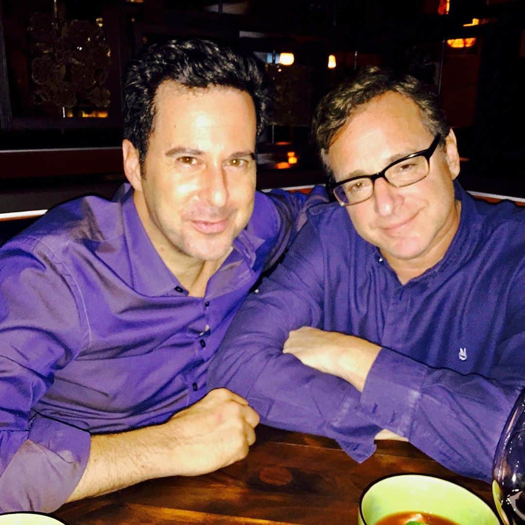 ボブ・サゲットのインスタグラム：「A very Happy Birthday to my brother from another mother (Thank God) @jonnysilverman !!!   You know you are a good friend for life with someone when you made plans to go out to dinner (back in the day) and wore matching purple shirts. Huge Prince fans, but still, it looks like we were Siamese twins.   And there’s no other dear friend I’d rather be attached to surgically. 😳   Love you Jonny, and here’s to many more years of deep love and friendship. Oh, and thanks for marrying Kelly and I with the help of your amazing wife @jennigan1 !!!! 🎉💜」