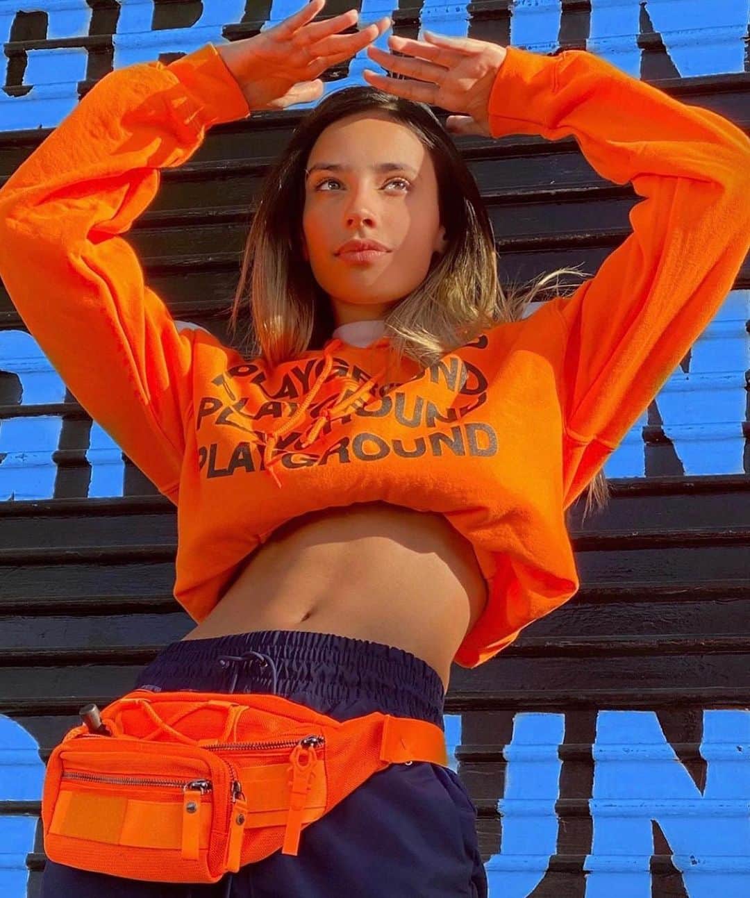 ジョージジーナ&ルーシーのインスタグラム：「We can’t get enough of @kyliecantrall 🧡 She’s wearing our Belly Bean (neon special )」