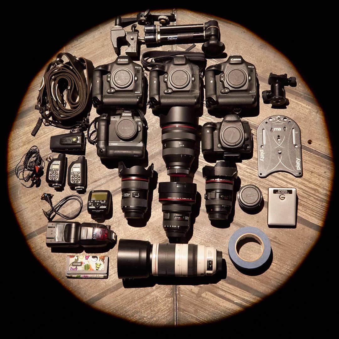 CANON USAさんのインスタグラム写真 - (CANON USAInstagram)「Find out what's in #CanonExplorerOfLight @davidbergman's gear bag! "The camera has been my all-access pass to historical moments, championship sporting events and concert stages around the world for nearly 30 years. Most recently, I was on the road with Bon Jovi and Luke Combs while also hosting my exclusive #shootfromthepit live concert photography workshops. As a tour photographer, my goal is to capture the show in a new way each night while also documenting life on the road for the artists and their fans.  Running thousands of frames though my cameras every day means that the gear I use has to withstand the enormous pressures I put on it. The Canon EOS-1D X Mark II - and now the Mark III - bodies are built to last, shoot 14-20 frames a second, and handle high ISOs like 6400 and 12,800 without a problem. I carry two on my shoulders during the show with the EF 24-105 and 100-400 lenses so I can quickly switch from wide to tight without missing any of the action on stage.  I use remote cameras to make unique images from locations that may not be accessible during the show. I put another EOS-1D X Mark II on stage with a 24-70 2.8, and the smaller/lighter EOS 5D Mark IV overhead in the lighting truss with the 11-24. My fifth traveling body is the full-frame EOS R mirrorless with the RF 28-70 f/2, which is like having three prime lenses in one. Because I can shoot silently and in very low light, I carry this setup with me backstage during the day to capture candid moments using only available light. I have the EF-EOS-R adapter just in case I want to use the R with one of my EF lenses.  I always have at least one 600EX II-RT Speedlite to shoot the artist’s 'meet and greet' photos, and can make a simple one light portrait using the ST-E3-RT wireless transmitter if the opportunity arises. The other items needed to complete my kit include remote mounting hardware and transceivers, a card wallet, backup hard drives, in-ear monitors, and gaffers tape."」8月6日 4時51分 - canonusa