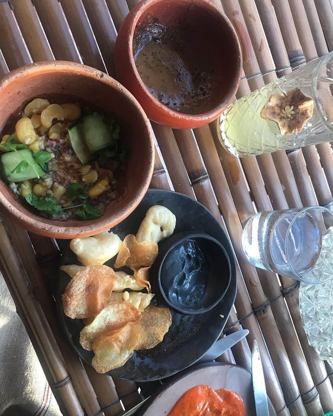 トームさんのインスタグラム写真 - (トームInstagram)「#Basico is anything but basic. The food is phenomenal, often veg or vegan, and served elegantly in a fancy expansive beach hut without any pretension. For your pleasure, the menu, across two nights, two tables, many drinks and several mosquitoes : 1/ Fried Plantain Tamal w Cotija Cheese, Green Tomato amd Quinoa stuffed Puff Corn Pastry; Oaxaca Cheese wrapped in Spinach, RedPepper Sauce and AVOCADO SALT; Lentils Terrine in Chaya leaf w Miso Demi glace and tanner mustard seed  2/ Broad Bean Ceviche w Cucumber, Green Tomato, Cilantro mixed and bathed w Lemon, Avocado Oil and Habnero Chilli Sauce; Basico #fishandchips w classic corn tempura fish, potato chips and BLACK MAYONNAISE  3/ Cabbage BBQ wrapped by Plantain Leaf and BBQSauce, white bean purée smoked tomato and leek  4/ Duck Salpicon w Duck Confit, Radish, Cucumber, Cabbage and Sour Orange on Corn Tortilla  5/ VEGAN MOLE w Mushroom and Huauzontle, tanned onion w Oregano and the freshest tortillas in the known universe  6/  Tuna Toast cubes w Soy and Ginger dressing and home made Avocado and ASH Mayonnaise  7/ Grilled Octopus ‘cooked’ at low temperature with Atichucha Sauce, Broad Been Puree, Grelot Onions and Sweet Potato 8/ CHOCOLATE Crumble w a semi long chocolate, creamy chocolate, cocoa nibs and dulche de Lecter ice cream  9/ Table 1wuth a view to the sand streets of Holbox  10/ Table 2, with Besser Brick wall @caitlinstutely」8月6日 9時00分 - tomenyc