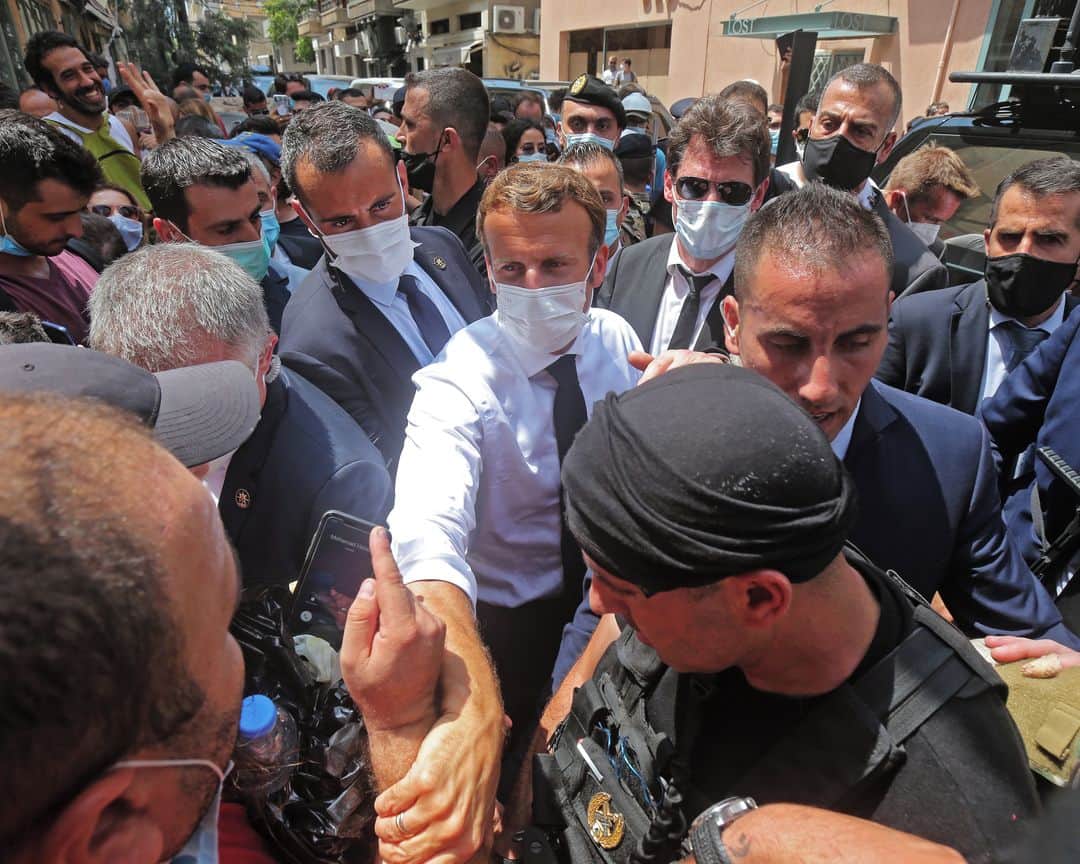 AFP通信さんのインスタグラム写真 - (AFP通信Instagram)「AFP Photo - Macron visits traumatised Lebanon to offer help, urge reform - 📷 @anwaramro (3, 4) 📷 Joseph Eid (6)⁣ .⁣ French President Emmanuel Macron visited shell-shocked Beirut Thursday, pledging support and urging change after a massive explosion devastated the Lebanese capital in a disaster that has sparked grief and fury.⁣ .⁣ "Lebanon is not alone," he tweeted on arrival before pledging Paris would coordinate international relief efforts after the colossal blast killed at least 137 people, wounded thousands and caused billions of dollars in damage.⁣ .⁣ But Macron also warned that Lebanon -- already mired in a deep economic crisis, in desperate need of a bailout and hit by political turmoil -- would "continue to sink" unless it implements urgent reforms.⁣ .⁣ Public anger is on the boil over the blast caused by a massive pile of ammonium nitrate that had for years lain in a ramshackle portside warehouse -- proof to many Lebanese of the deep rot at the core of their state system.⁣ .⁣ Macron visited Beirut's harbourside blast zone, now a wasteland of blackened ruins, rubble and charred debris where a 140 metre (460 feet) wide crater has filled with sea water.⁣ .⁣ As Macron inspected a devastated pharmacy, angry crowds outside vented their fury at their "terrorist" leadership, shouting "revolution" and "the people want an end to the regime!"⁣ .⁣ #Lebanon #Beirut #BeirutBlast #Macron #EmmanuelMacron」8月6日 21時46分 - afpphoto