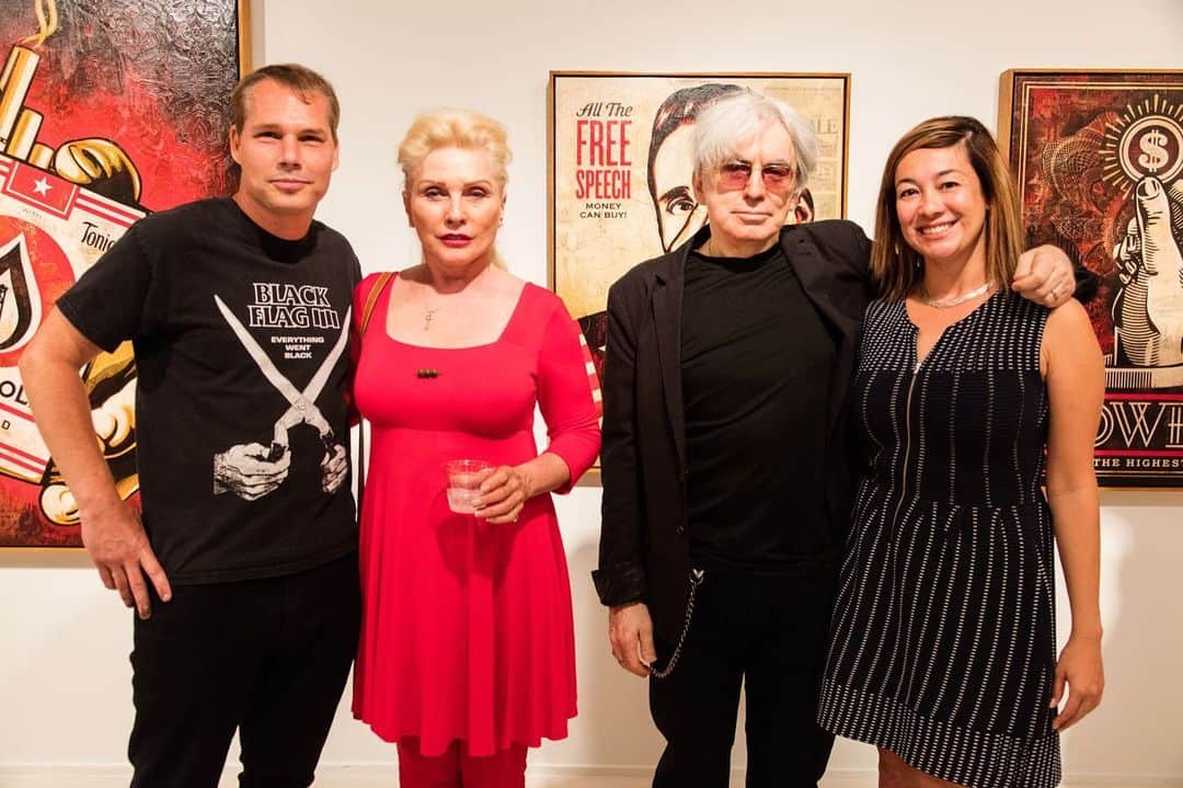 Shepard Faireyのインスタグラム：「Throwing it back to my trip to New York and New Jersey back in 2015. It was a very intense but exhilarating trip! My team and I opened the “On Our Hands” show at the Jacob Lewis Gallery and we completed my 143′ x 37’ mural in Jersey City, facilitated by Mana Contemporary. I  spent the better part of that year working on the fine art and print editions for the collection in the Jacob Lewis Gallery, and the Pace Prints Gallery a floor below, so it was amazing to finally see it all in frames and on the walls. When we got to NeueHouse in New York, I got to do a discussion with Chris Stein of Blondie, one of my creative heroes and a friend of many of my other heroes including Andy Warhol. We discussed Chris’ book, "Chris Stein / Negative," and my monograph, "Covert to Overt: The Under/Overground Art of Shepard Fairey." The great artists and musicians who came out to see the show is too long a list for me to name drop here tastefully, but it should go without saying that it was an incredible honor and quite humbling to be supported by so many people who have inspired me.⁠⠀ -Shepard⁠ 📷: @jonathanfurlong ⁠⠀ #throwback #tbt #obey #obeygiant #shepardfairey」