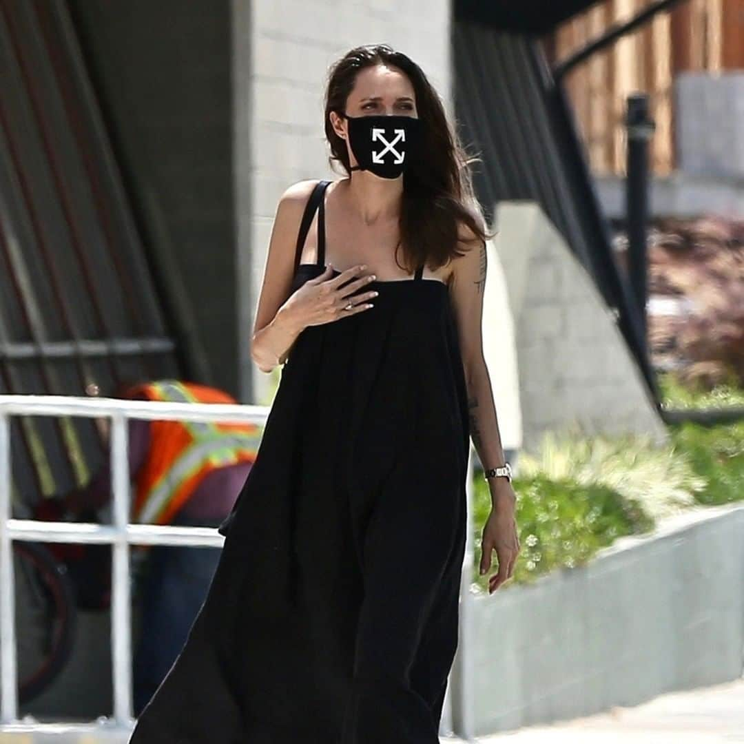 Vogue Runwayさんのインスタグラム写真 - (Vogue RunwayInstagram)「Wearing a mask is essential. Take a page from Angelina Jolie's style playbook and try a style from @off____white with a simple black dress. Find out more about her summer look at the link in bio.」8月7日 7時55分 - voguerunway