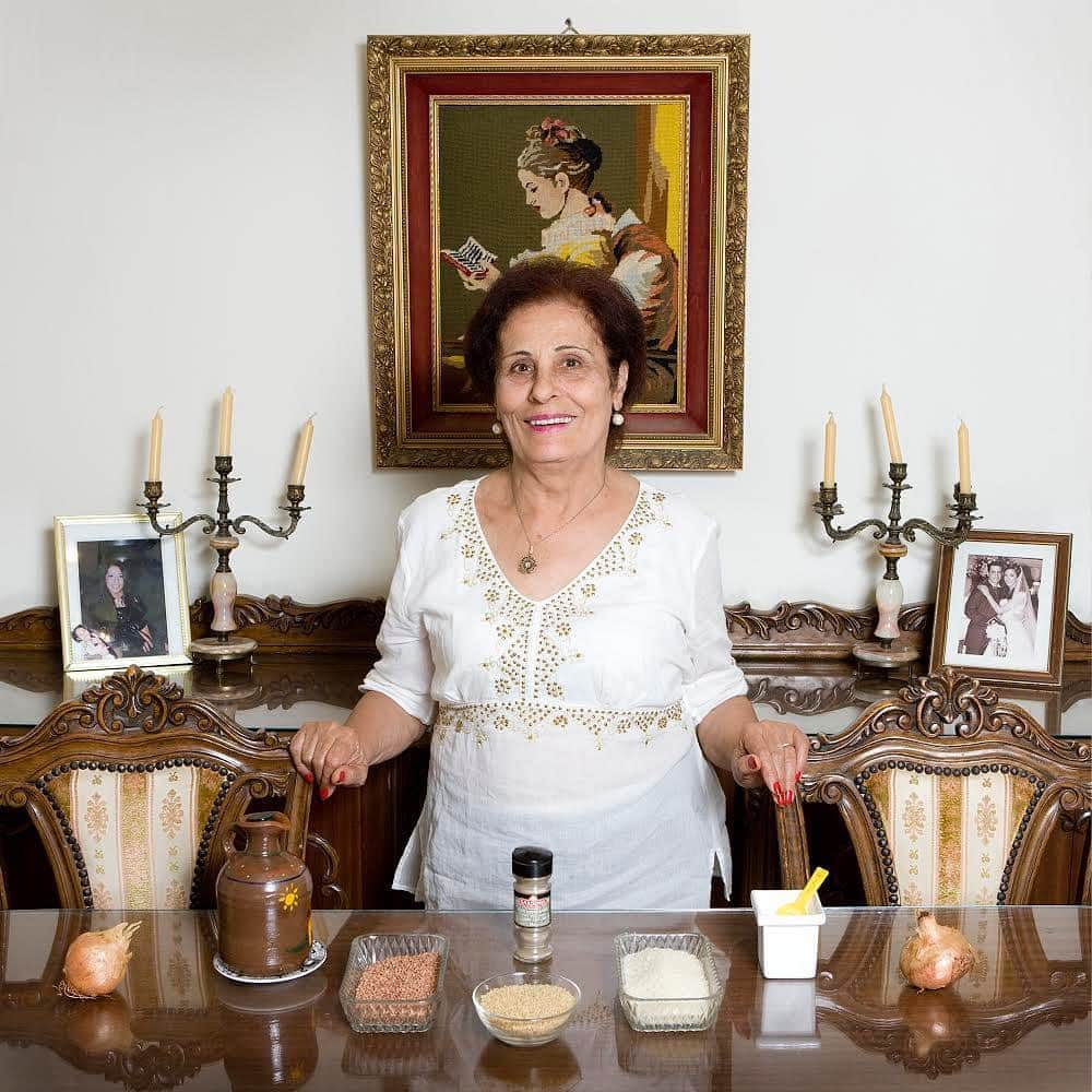 thephotosocietyさんのインスタグラム写真 - (thephotosocietyInstagram)「Photo by @gabrielegalimbertiphoto - THINKING OF MY FRIENDS IN BEIRUT  From my project In Her Kitchen: Grandmas are the best cooks! This is Wadad Achi 66, from Beirut, Lebanon. Whenever I meet grandmas on my travels, I ask the same question: Can you make your best recipe for me? This is Mujadara (Rice and Lentil Cream) Serves 4 - Ingredients 1 cup dried brown or green lentils 3 to 4 tablespoons olive oil 2 yellow onions, finely chopped 1 cup long-grain rice 1 cup bulgur (cracked wheat) Salt and pepper Sliced onions, sliced radishes, and chopped mint, for garnish 1- Place the lentils in a medium saucepan and add water just to cover. The lentils should absorb all the water, so add more if needed while cooking. Bring to a boil, then reduce the heat to medium-low and simmer for 25 to 30 minutes, until the lentils are very tender. 2 -While the lentils are cooking, heat the oil in a medium-size skillet. Fry the onions over medium-high heat until they have browned and are crispy, about 10 minutes. 3 -When the lentils are tender and have absorbed all of the water, remove them from the heat and let cool slightly. Place them in a food processor or blender and puree them. Place the puree in a saucepan and add 3 cups of water to the puree and bring the liquid to a boil. Add the rice and the bulgur, and season with salt and pepper. Reduce the heat to a simmer, stirring frequently. (It may be necessary to add more water if all of the liquid has been absorbed before the rice is tender.) After about 15 minutes, or 5 minutes before the rice is ready, add the fried onions. 4 - When the rice is tender, serve the mujadara in soup dishes, garnished with onions, red radishes, and mint. #food #grandma #lebanon #beirut」8月8日 2時58分 - thephotosociety