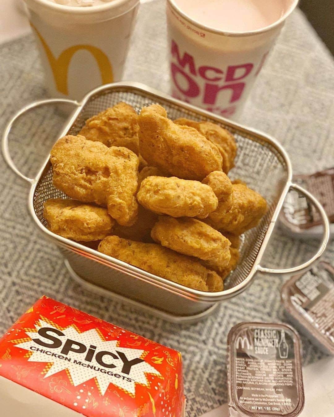 McDonald's Philippinesのインスタグラム：「Spice up your weekend with our NEW Spicy McNuggets and McDo Shakes for you and your homebuddies!   Head to McDo and order via Drive-Thru, Take-Out, or Pick-Up. Also available on McDelivery or call 8888-6236 (for NCR).   Photo from @thefoodiestation」