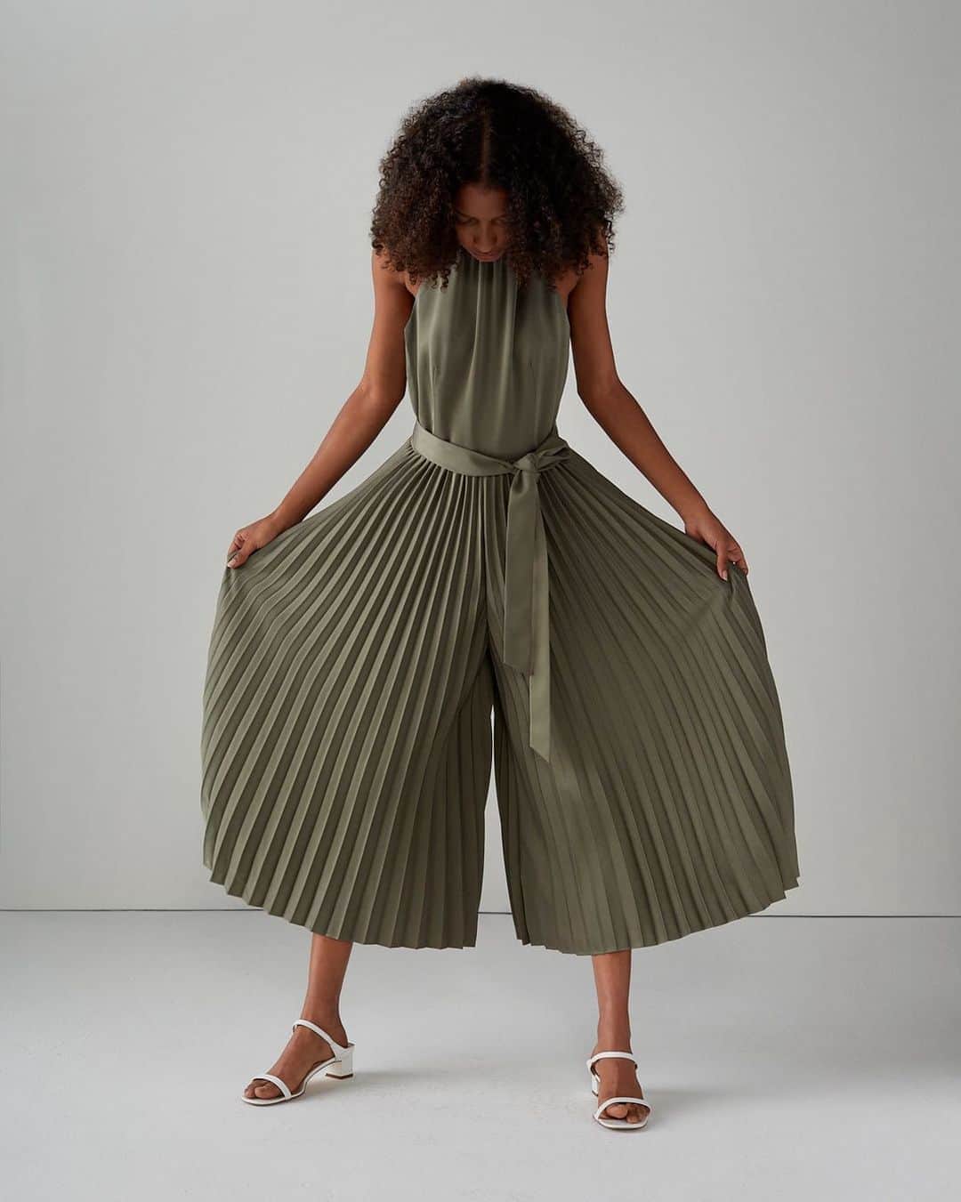 Club Monacoのインスタグラム：「Yes, pleats. A one-step approach to dressing: The Pleated Tie Neck jumpsuit.」