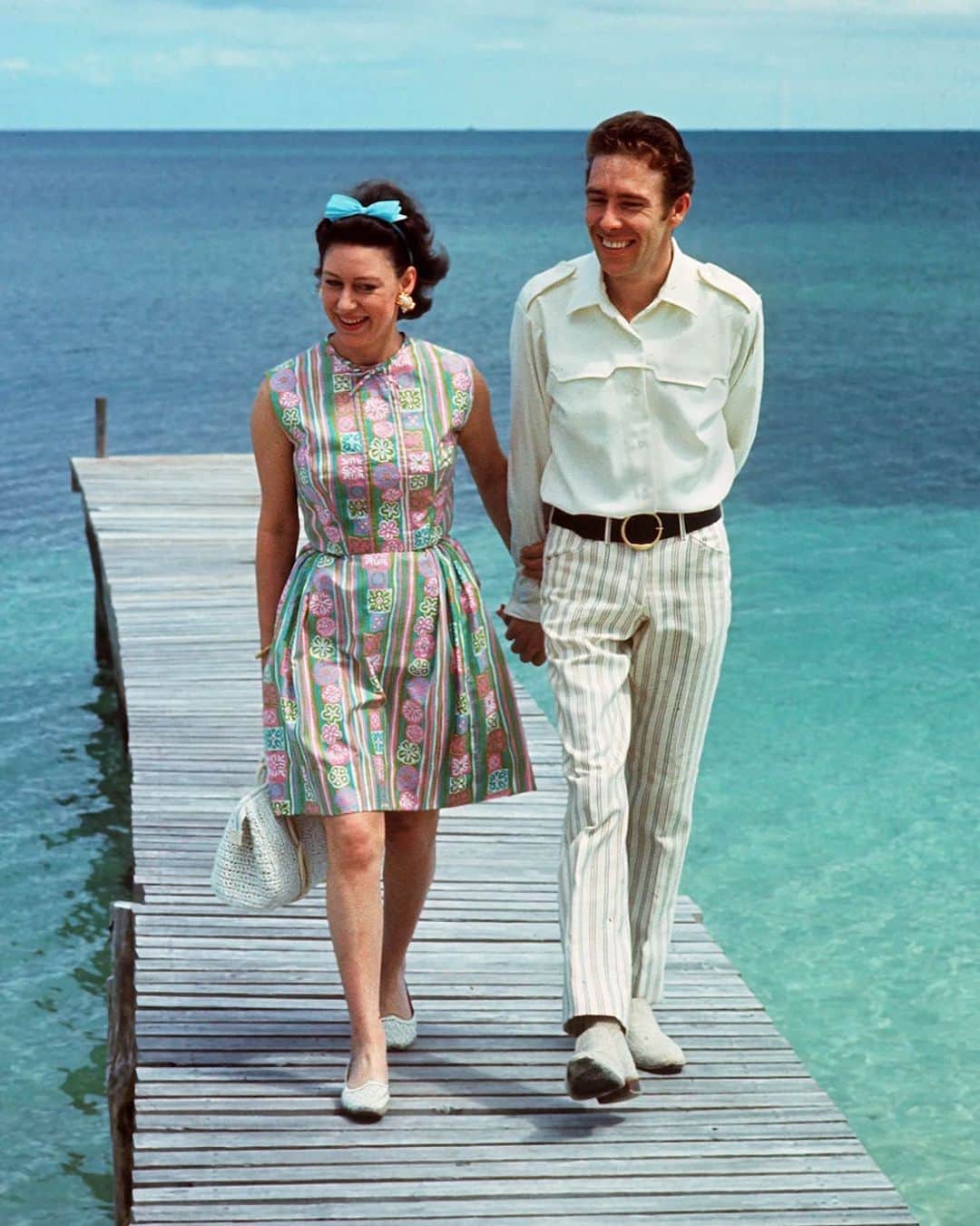 British Vogueさんのインスタグラム写真 - (British VogueInstagram)「If you’re seeking inspiration for your heatwave looks, see how Princess Margaret dressed for the summer during the ‘60s, ‘70s and ‘80s. From her spirited outfits for visiting her favourite getaway destination, the island of Mustique, to swimming in Sardinia and her honeymoon cruise in the Caribbean, click the link in bio for 15 times #PrincessMargaret embraced lively - and timeless - summer style.」8月9日 23時08分 - britishvogue