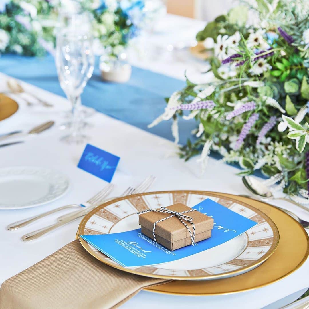 楽婚【公式】Instagramさんのインスタグラム写真 - (楽婚【公式】InstagramInstagram)「.﻿ ♡夏のテーブルコーディネート﻿ ﻿ 涼しげなブルーのペーパーアイテムと﻿ グリーンたっぷりの会場装花で﻿ とっても爽やかなご披露宴に＊。+﻿ ﻿ 会場：#アートグレイスウエディングフォレスト﻿ ﻿ @rakukon をフォローして﻿ 『#楽婚』をつけて、﻿ お写真の投稿大歓迎♡﻿ 公式IGでリグラムされるかも！？﻿ ﻿ Webでご予約はTOPのURLより♡﻿ ⇒@rakukon﻿ .﻿ #楽婚 #rakukon #ベストアニバーサリー﻿  #ベストブライダル﻿ #wedding #ウェディング﻿ #フォトウェディング﻿ #プレ花嫁 #卒花﻿ #日本中のプレ花嫁さんと繋がりたい﻿ #プラコレ #marryxoxo﻿ #ウエディングニュース﻿ #花嫁 #卒花嫁 #2020年夏婚﻿ 2020年秋婚 #2020年冬婚﻿ #2021年春婚 #2021年夏婚﻿ #式場探し#ナチュラルウェディング﻿ #結婚式準備 #結婚式場#weddingdress﻿ #Weddingphoto﻿ #ウェディングドレス﻿  #サマーウェディング﻿  #テーブルコーディネート﻿﻿ #ブルーコーデ」8月9日 19時12分 - rakukon