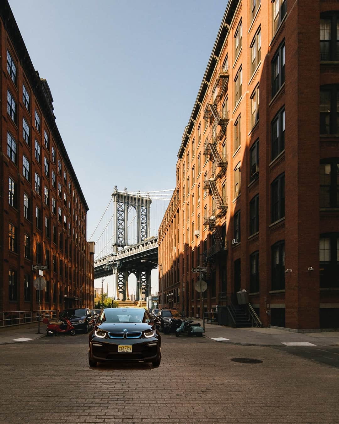 BMWのインスタグラム：「A bridge right into the future. #THEi3 #BMW @BMWi #BMWrepost @kevinwonka @BMWGroupCulture @sohohouse __ BMW i3 (120 Ah): Energy consumption in kWh/100 km (combined): 13.1. CO2 emissions in g/km (combined): 0. Further information: www.bmw.com/disclaimer. Acceleration (0-100 km/h): 6.9 s. Power: 125 kW, 170 hp, 250 Nm. Top speed (limited): 160 km/h.」
