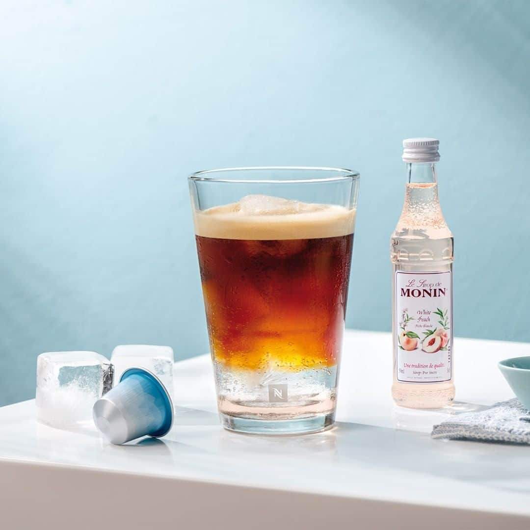 Nespressoさんのインスタグラム写真 - (NespressoInstagram)「Be your own Barista with our Fizzy Iced coffee recipe! 🧊😍   It has never been easier to make:  - 1 glass - 90g of ice cubes - 1 extract (40ml) of our Freddo Delicato capsule  Don't hesitate to add a little extra something with 10ml of White Peach Monin Syrup. Drink up and enjoy!  You can find the recipe on #NespressoRecipes (link in bio).  #Nespresso #CoffeeMadeForIce #BaristaCreations #IcedCoffee #CoffeeRecipe」8月12日 0時59分 - nespresso